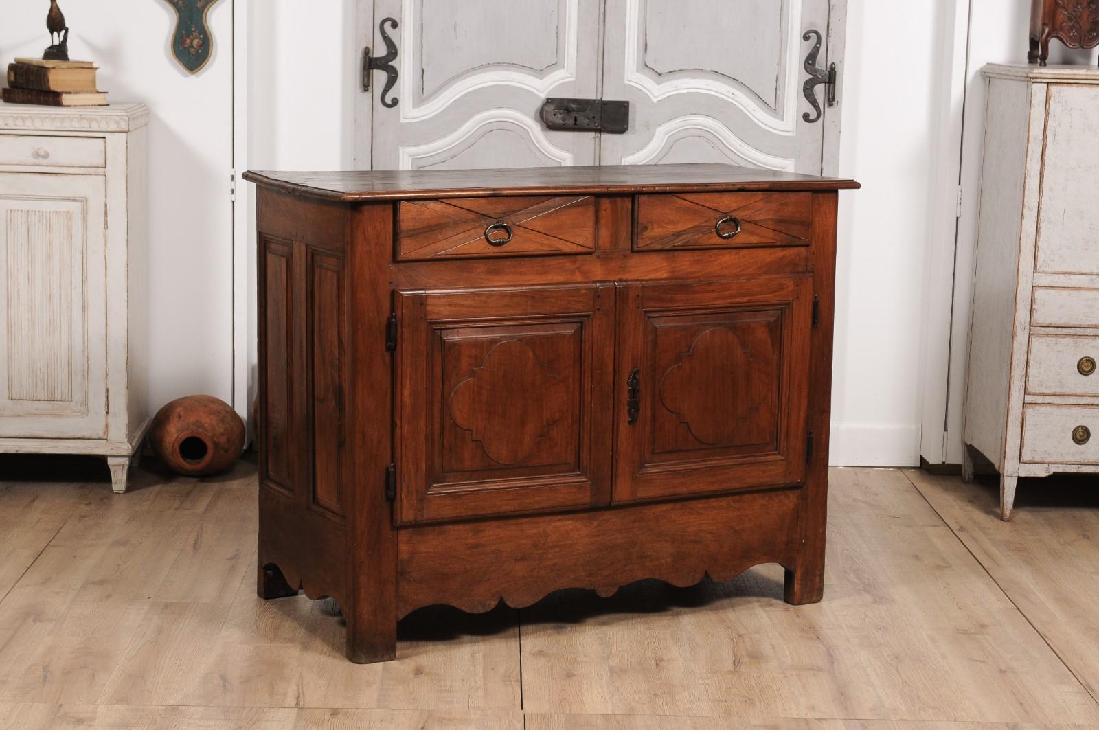 French Louis XIV Period 18th Century Walnut Buffet with Carved Quatrefoil Motifs For Sale