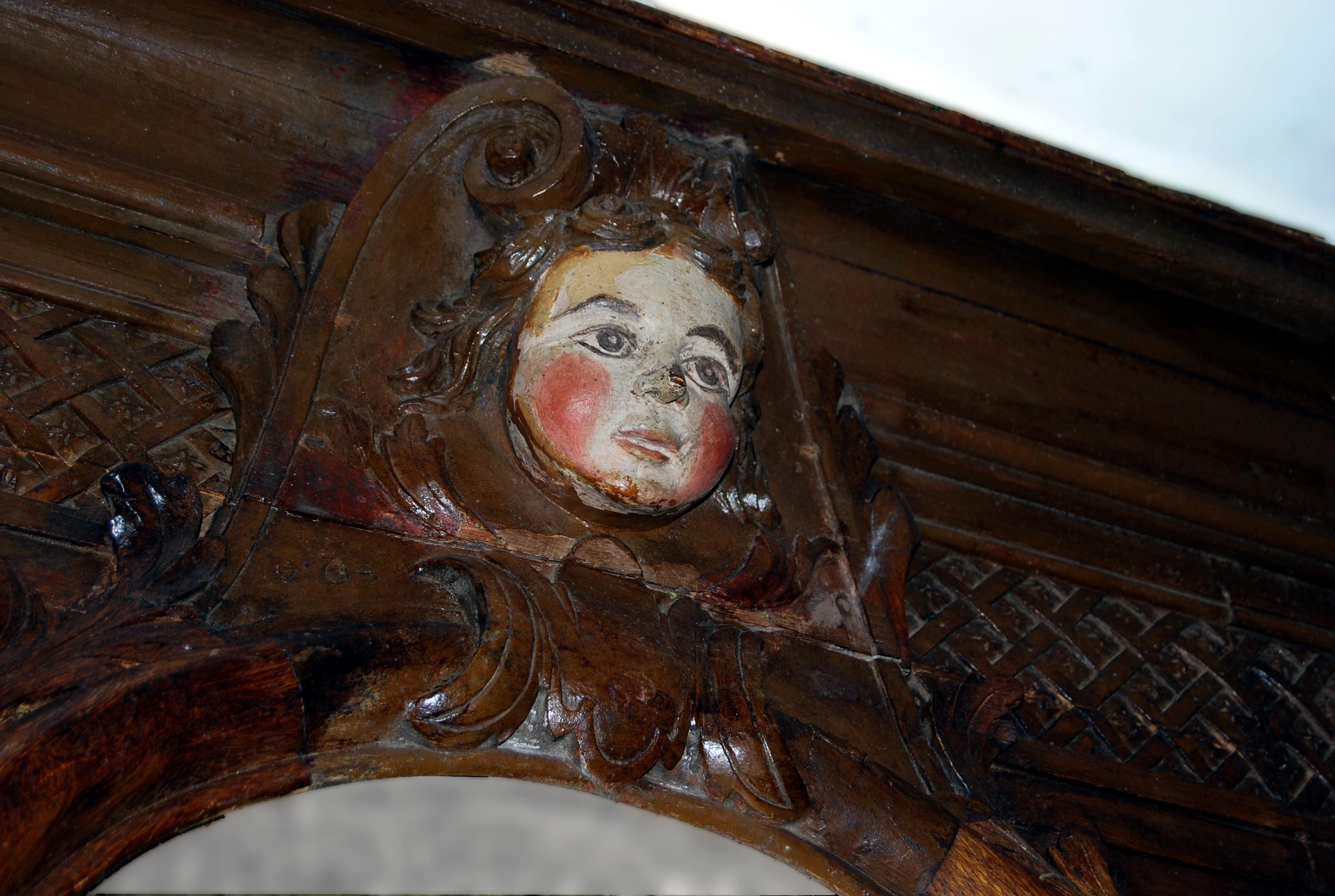 Hand-Carved Louis XIV period carved wood fireplace mantel with humanized moon decoration For Sale