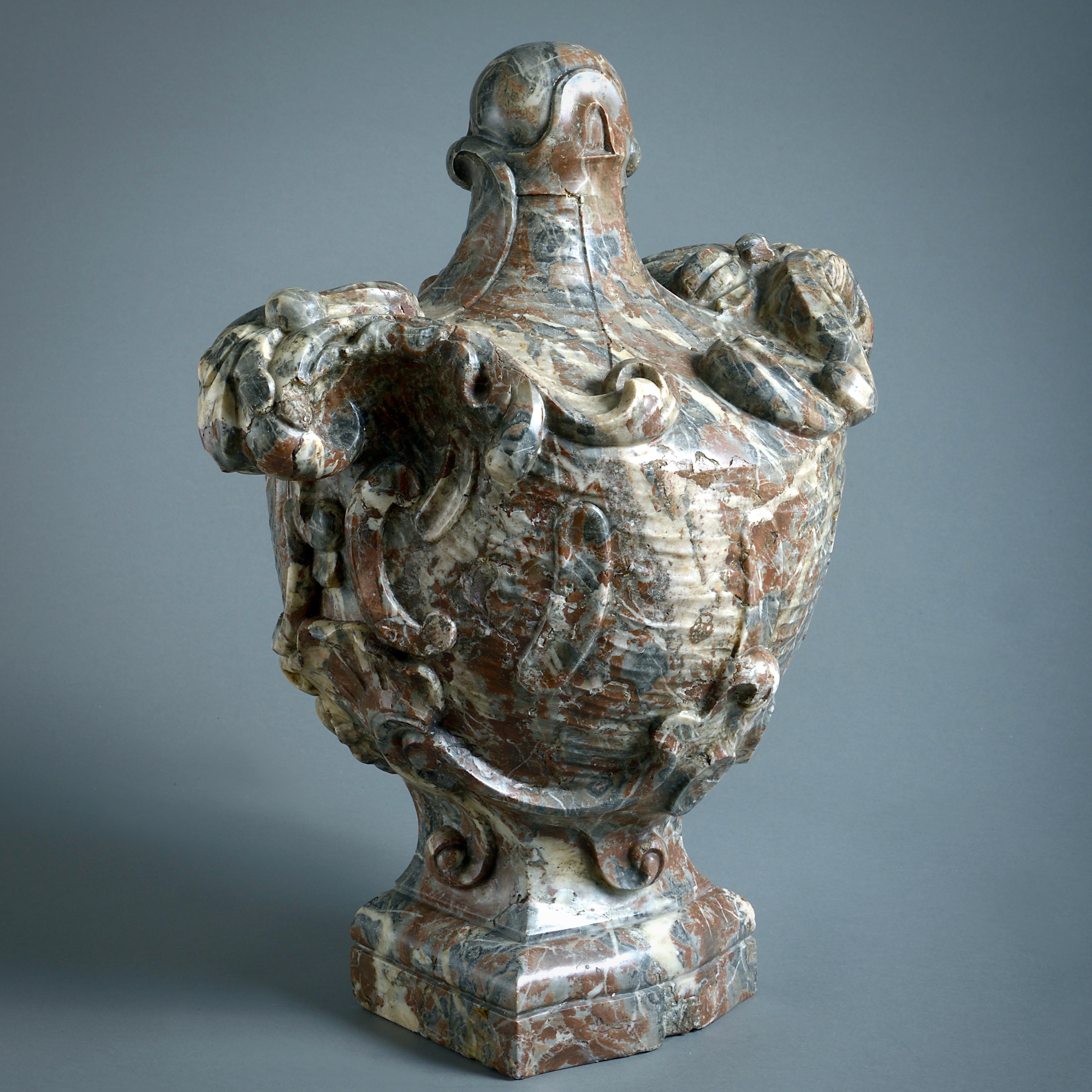 A magnificent Louis XIV 'Rouge de Flandres' marble Baroque ‘vase’, circa 1700.