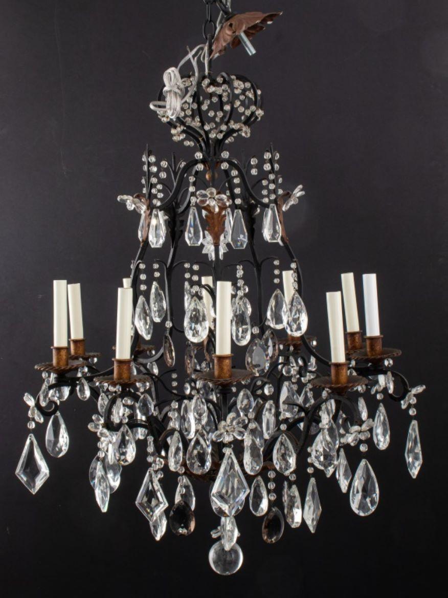 Louis XIV Style Ten-Light Crystal and Wrought Iron Chandelier, with faceted cut glass pendants and candlestick form lights. 37