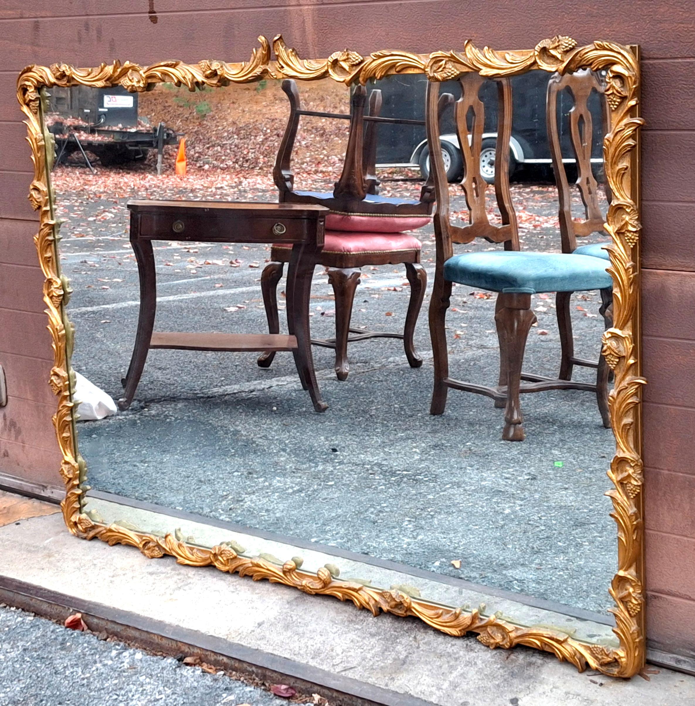 Autre Louis XIV Style Carved Giltwood Foliate Frame Wall Mirror, Circa 1920s en vente