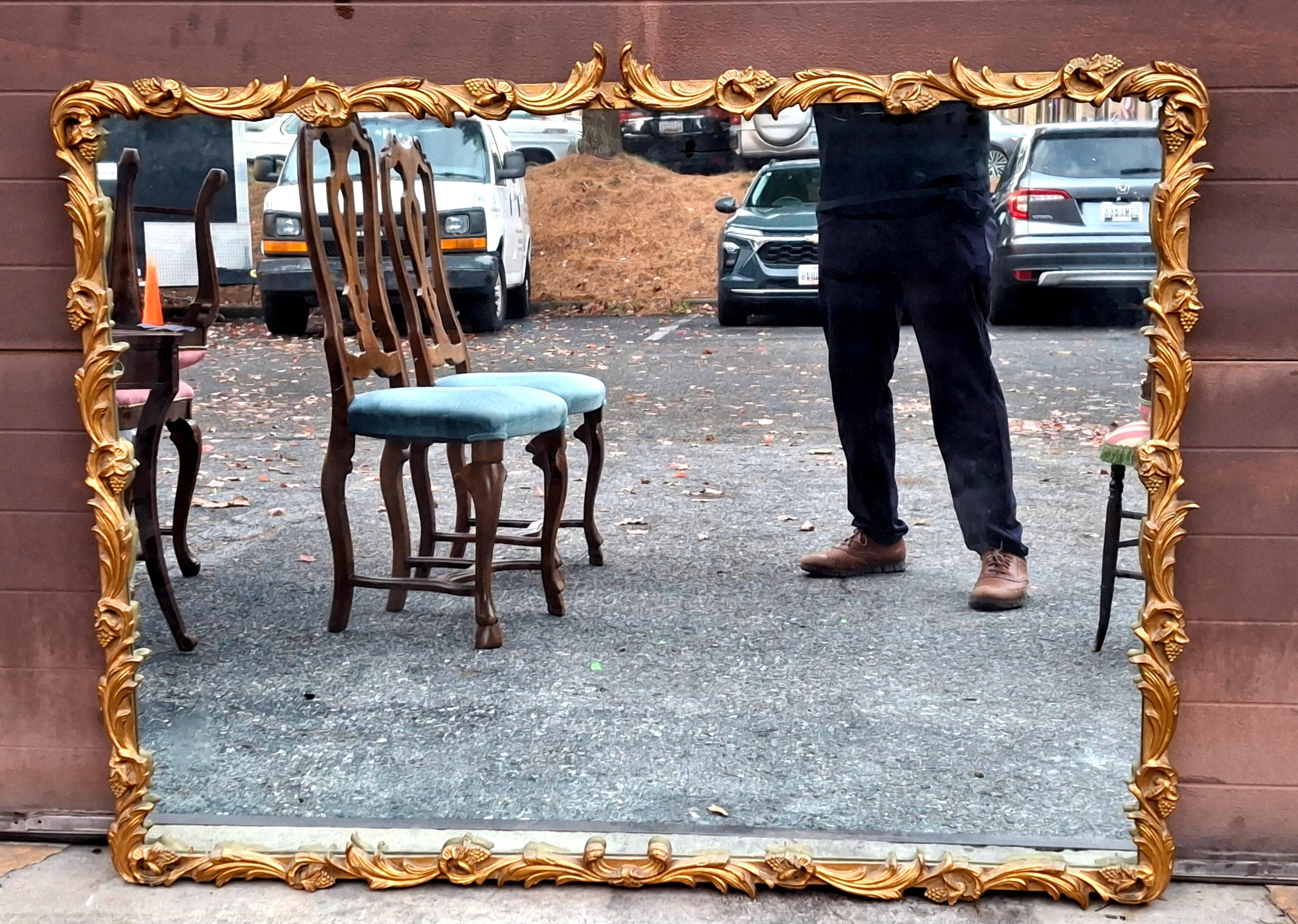 Louis XIV Style Carved Giltwood Foliate Frame Wall Mirror, Circa 1920s Bon état - En vente à Germantown, MD