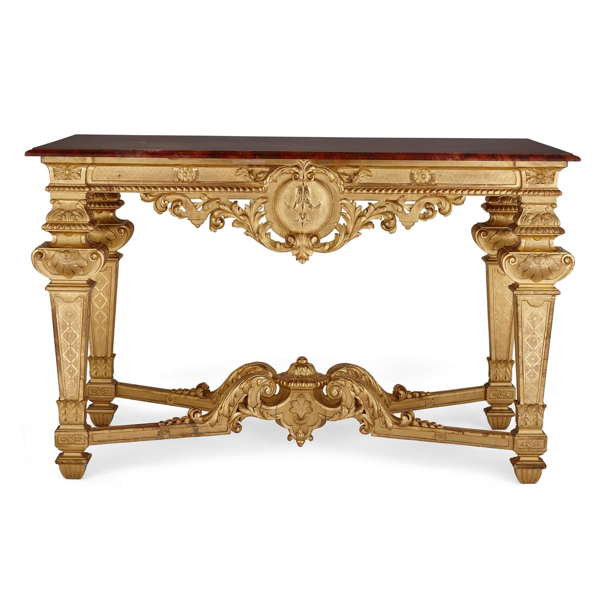 Louis XIV style carved giltwood rectangular console table
Italian, Late 19th Century
Height 90cm, width 142cm, depth 65cm

This Belle Epoque table takes inspiration from the very beginning of the French Golden Age of furniture making in the 18th