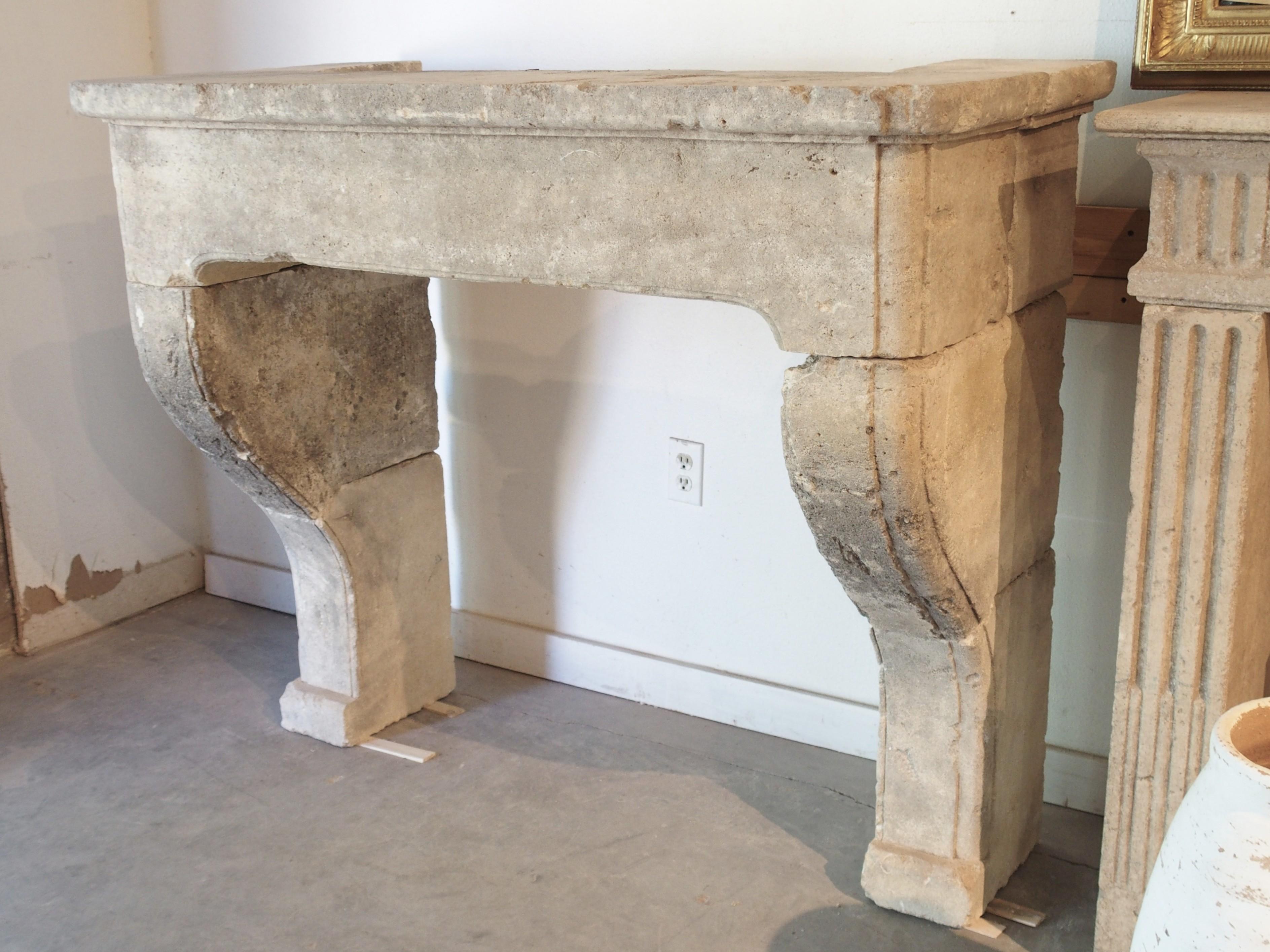 French Louis XIV Style Carved Limestone Fireplace Mantel from the South of France For Sale