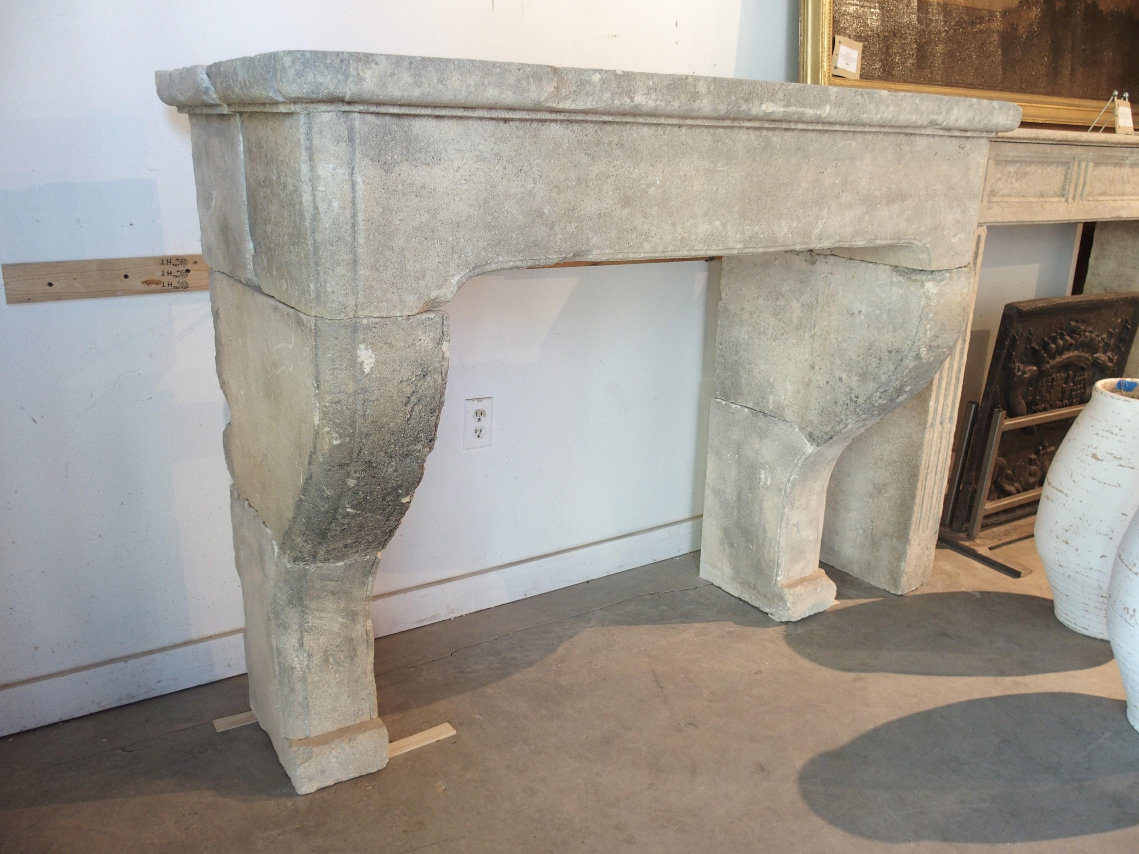 Louis XIV Style Carved Limestone Fireplace Mantel from the South of France In Good Condition For Sale In Dallas, TX