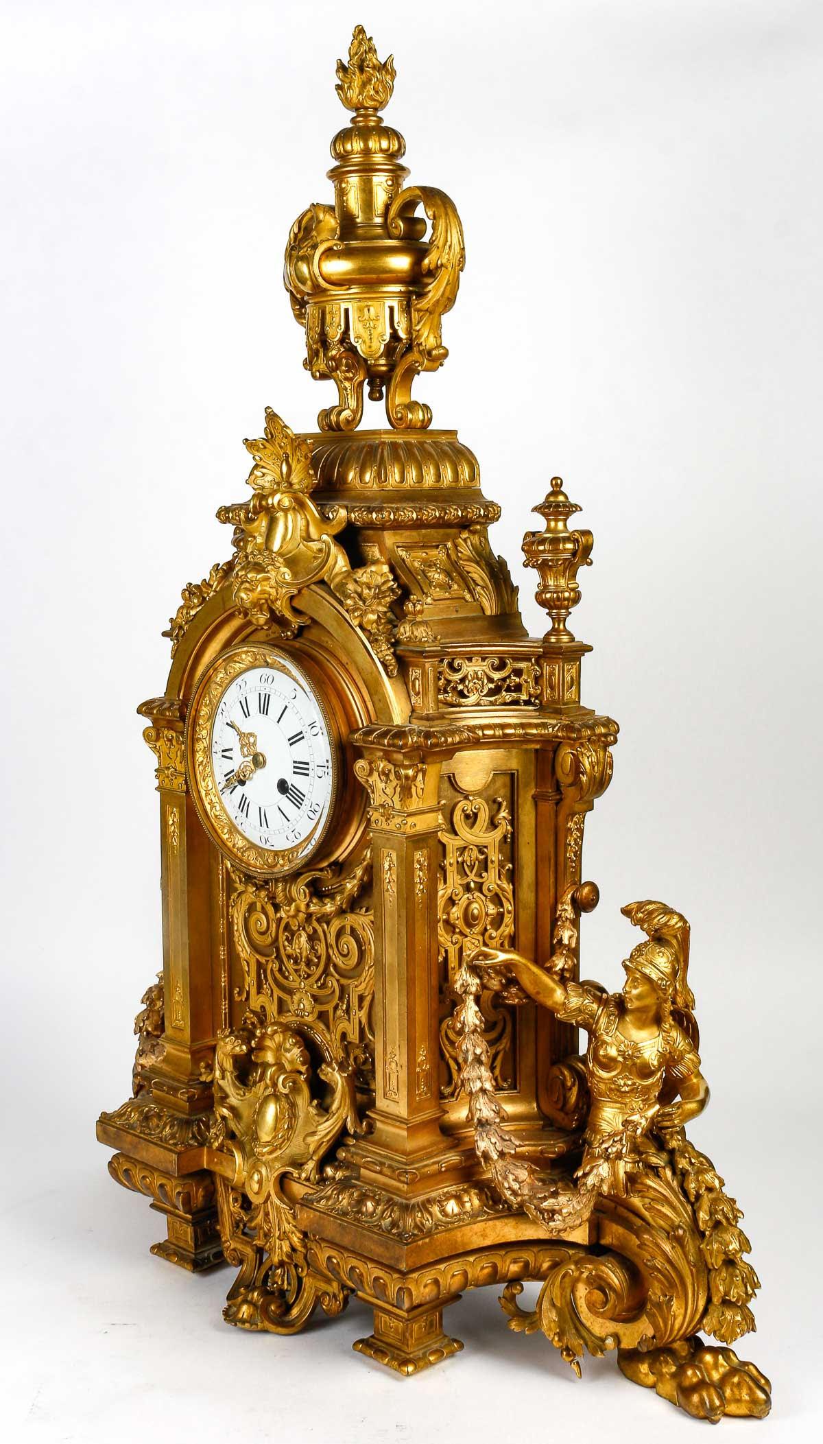Bronze Pendule Cartel en bronze doré et ciselé de style Louis XIV, XIXe siècle.
