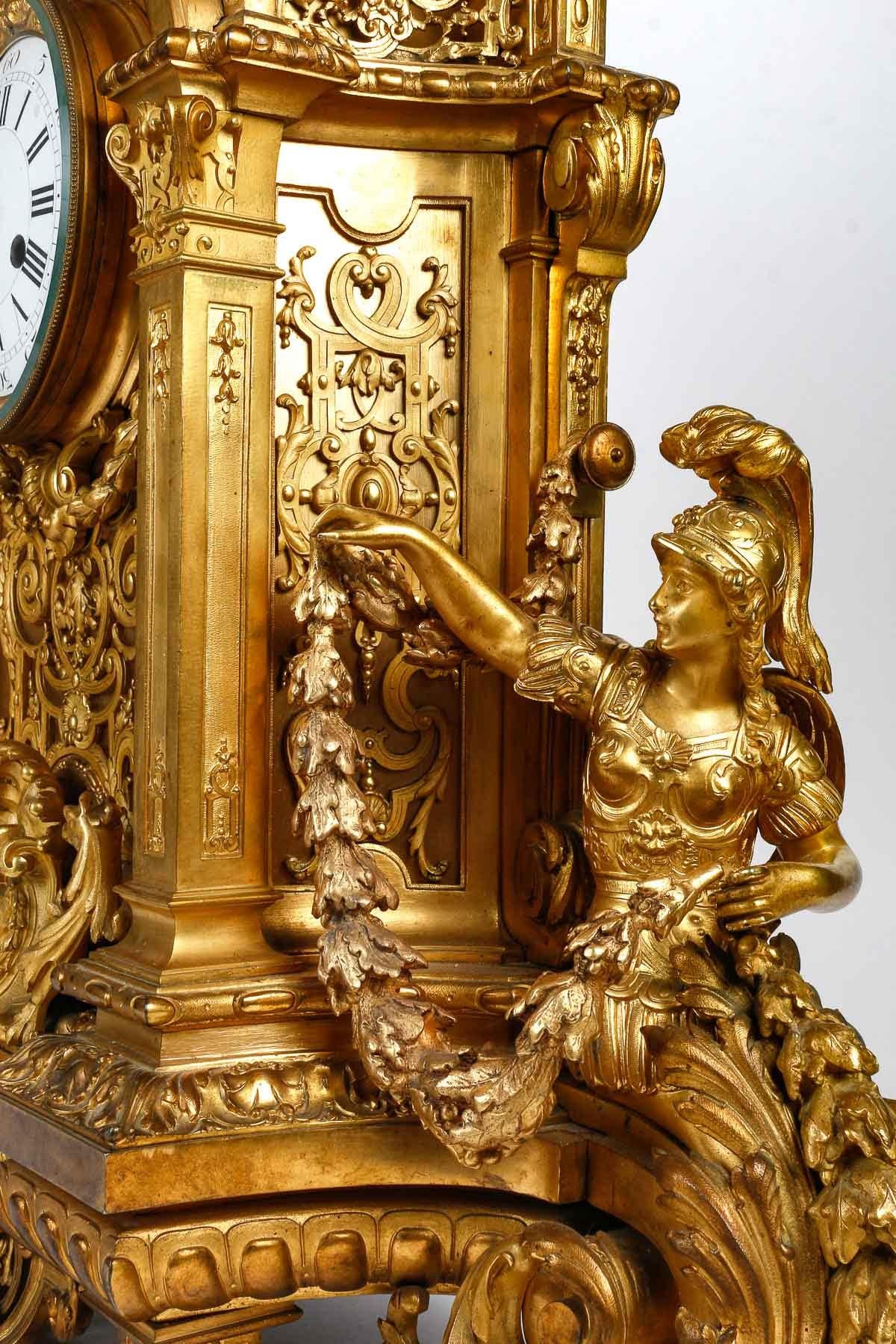 Pendule Cartel en bronze doré et ciselé de style Louis XIV, XIXe siècle. 1