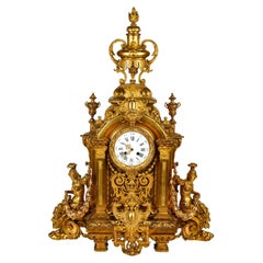 Louis XIV Style Gilt Bronze and Chased Cartel Clock, 19th Century.