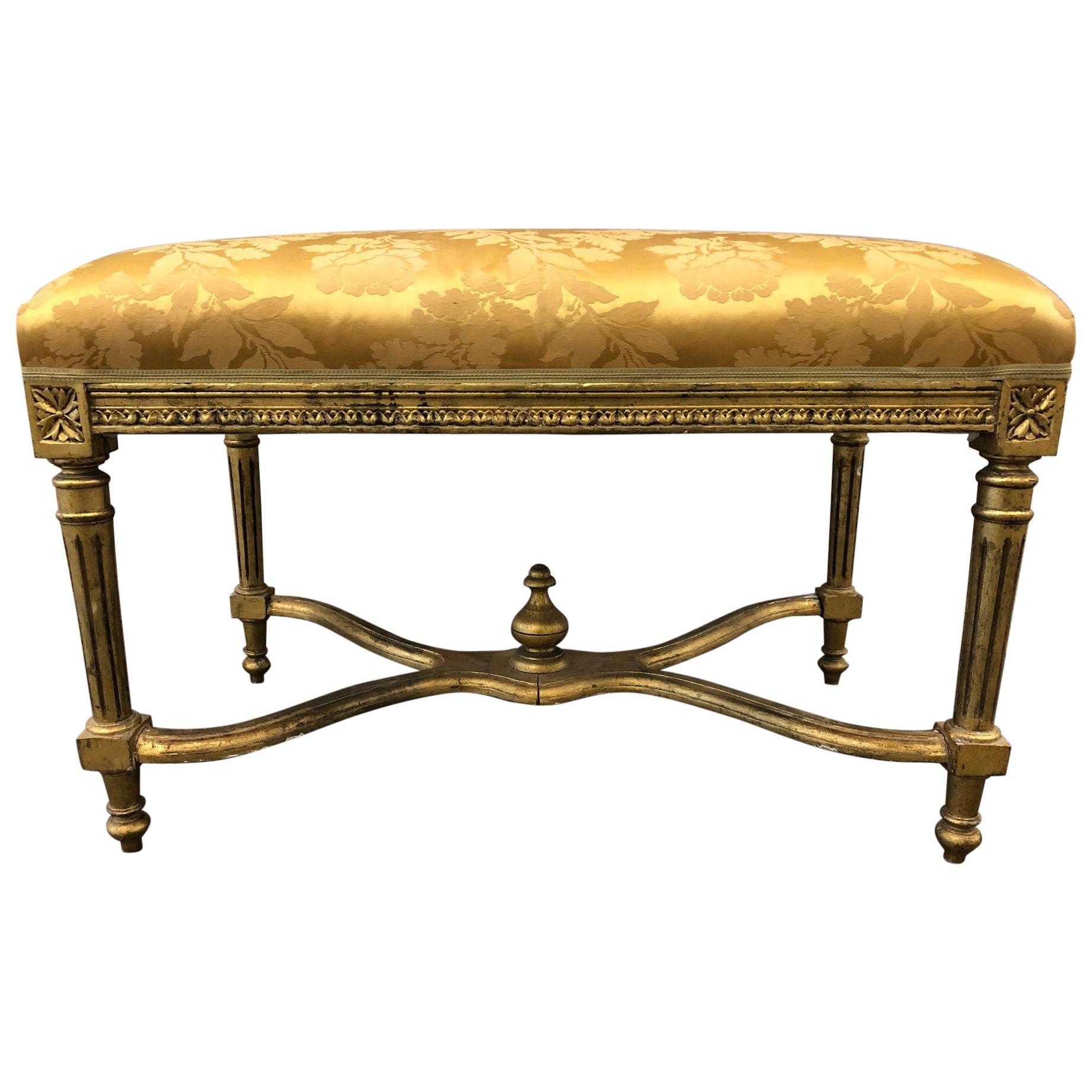 Banc en bois doré de style Louis XIV
