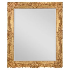 Miroir en bois doré de style Louis XIV