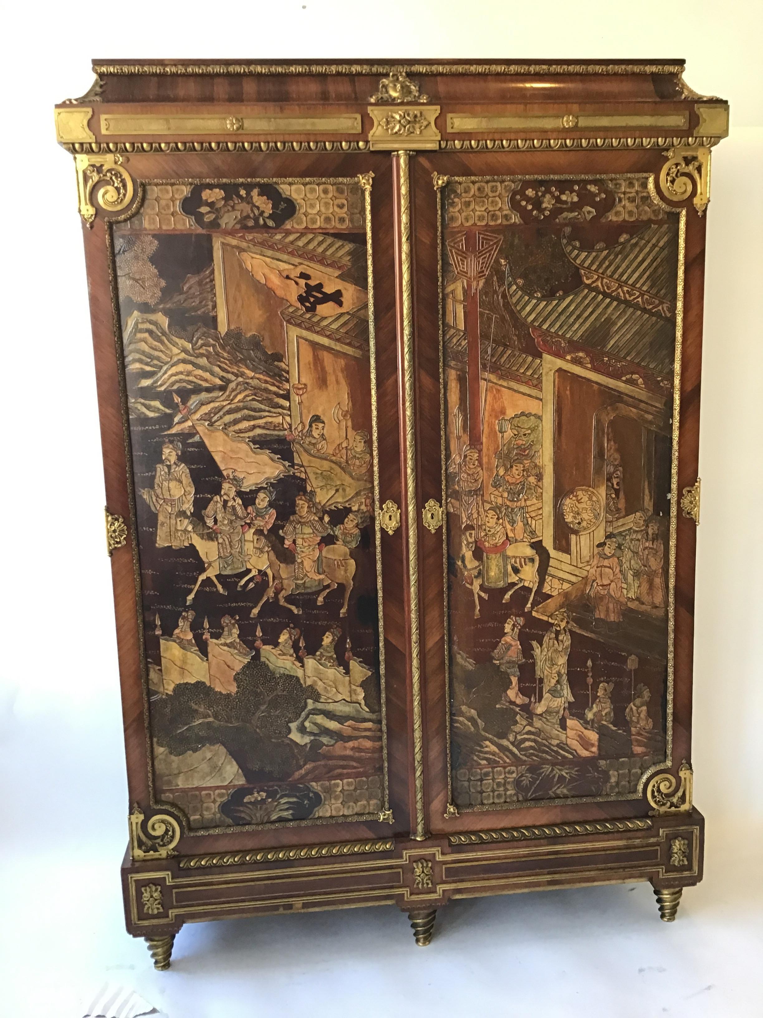 A Louis XIV ormolu-mounted kingwood and coromandel lacquered armoire by Francois Linke, circa 1900, Made in Paris. The rectangular top above a spreading pediment applied to the center with an Apollo mask, above a frieze applied with rectangular