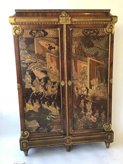 Armoire de style Louis XIV en bois de violette et coromandel par François Linke