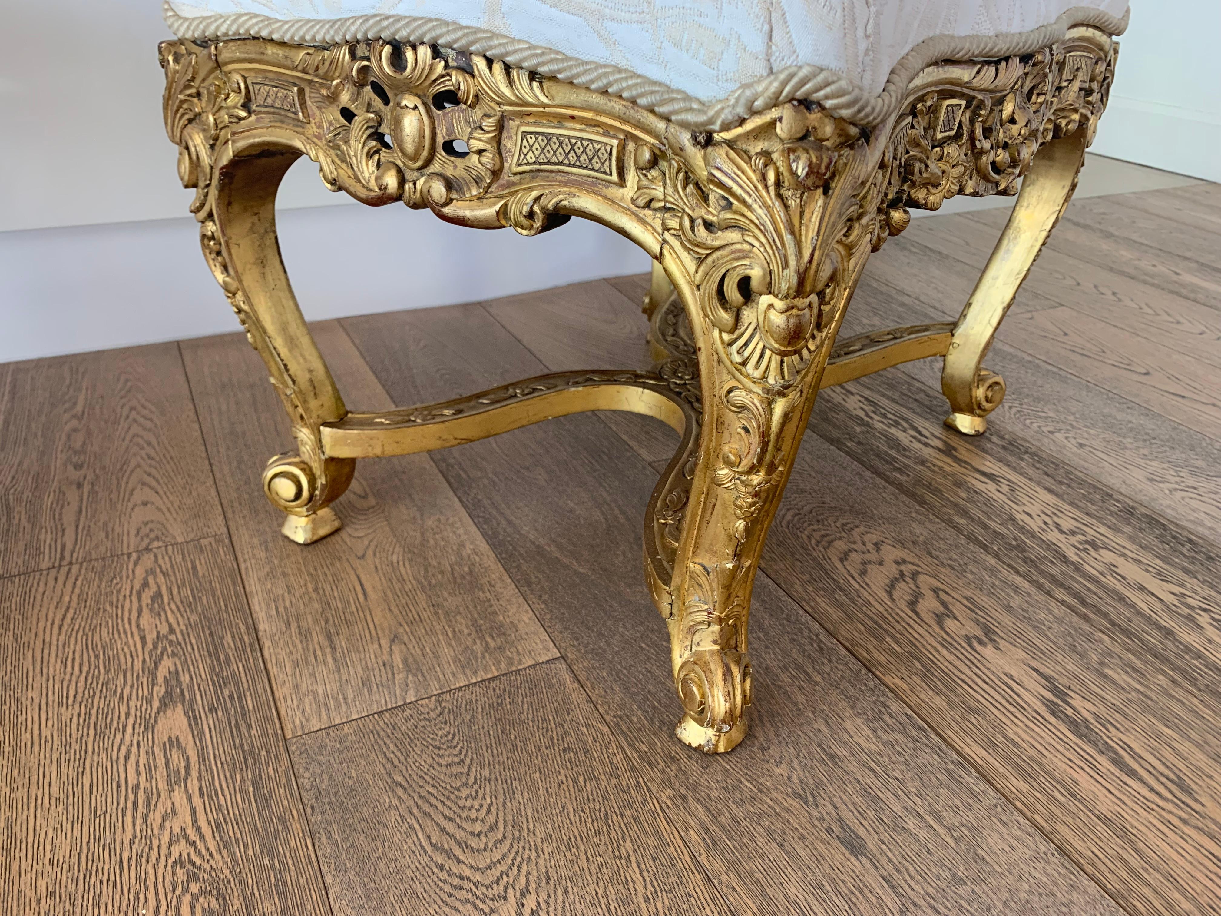 A magnificent and rare pair of stools louis XIV style in giltwood, the quality carving in this stools are execptional.