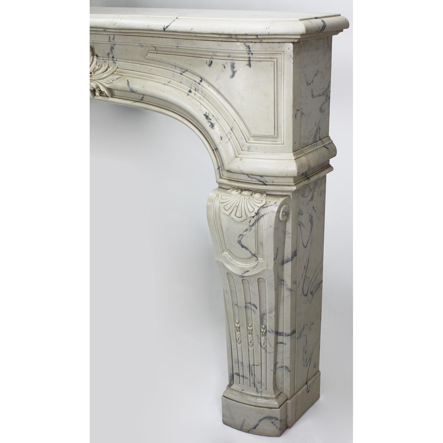 Louis XIV Style White and Veined White Cultured Cast-Marble Fireplace Mantel In Fair Condition For Sale In Los Angeles, CA
