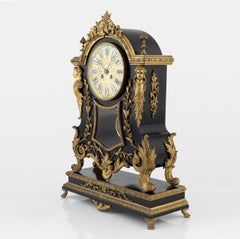 Pendule ancienne Louis XV Boulle en bois noir et bronze doré 19ème siècle