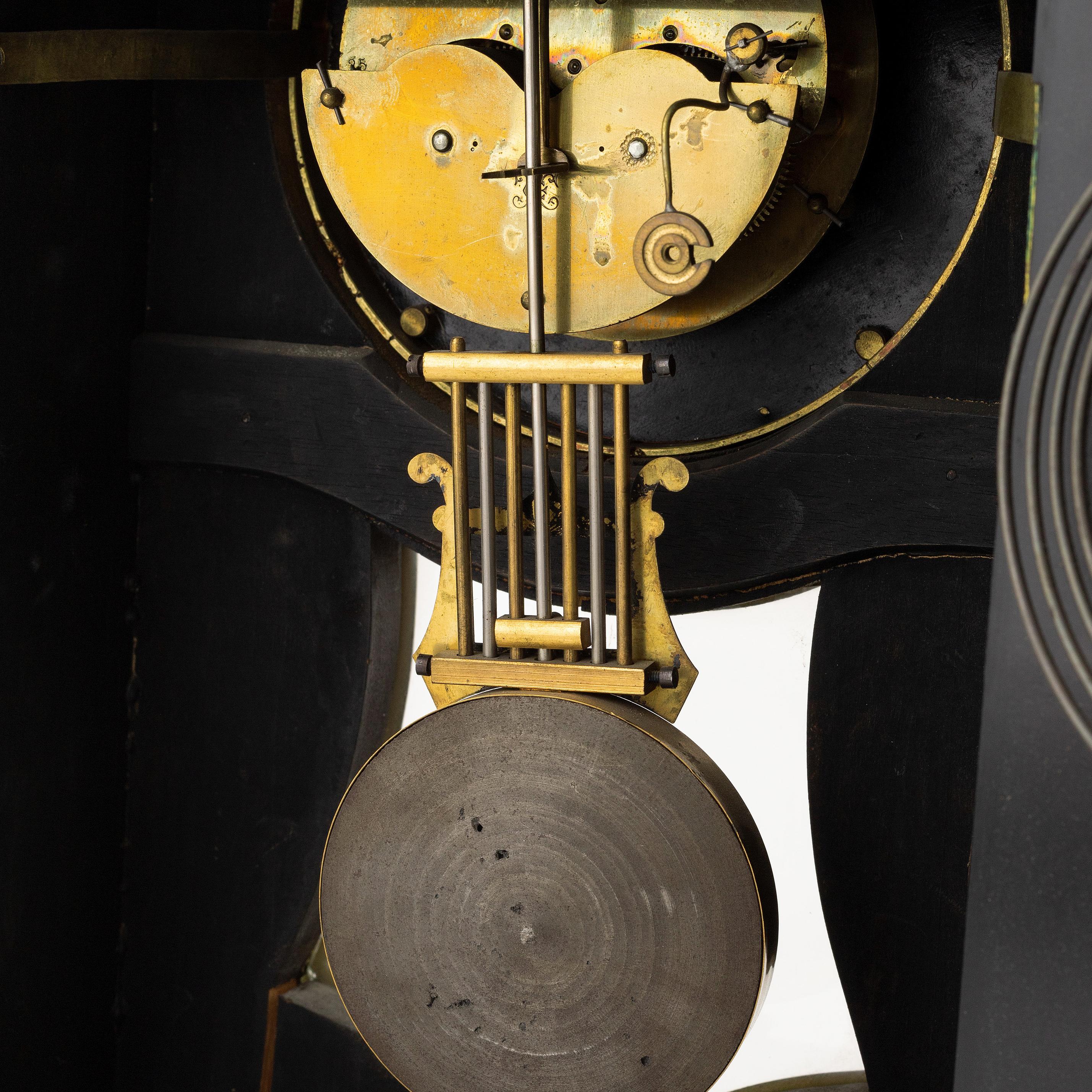Ottone Set di orologi antichi Luigi XV Boulle in legno nero e bronzo dorato XIX secolo in vendita