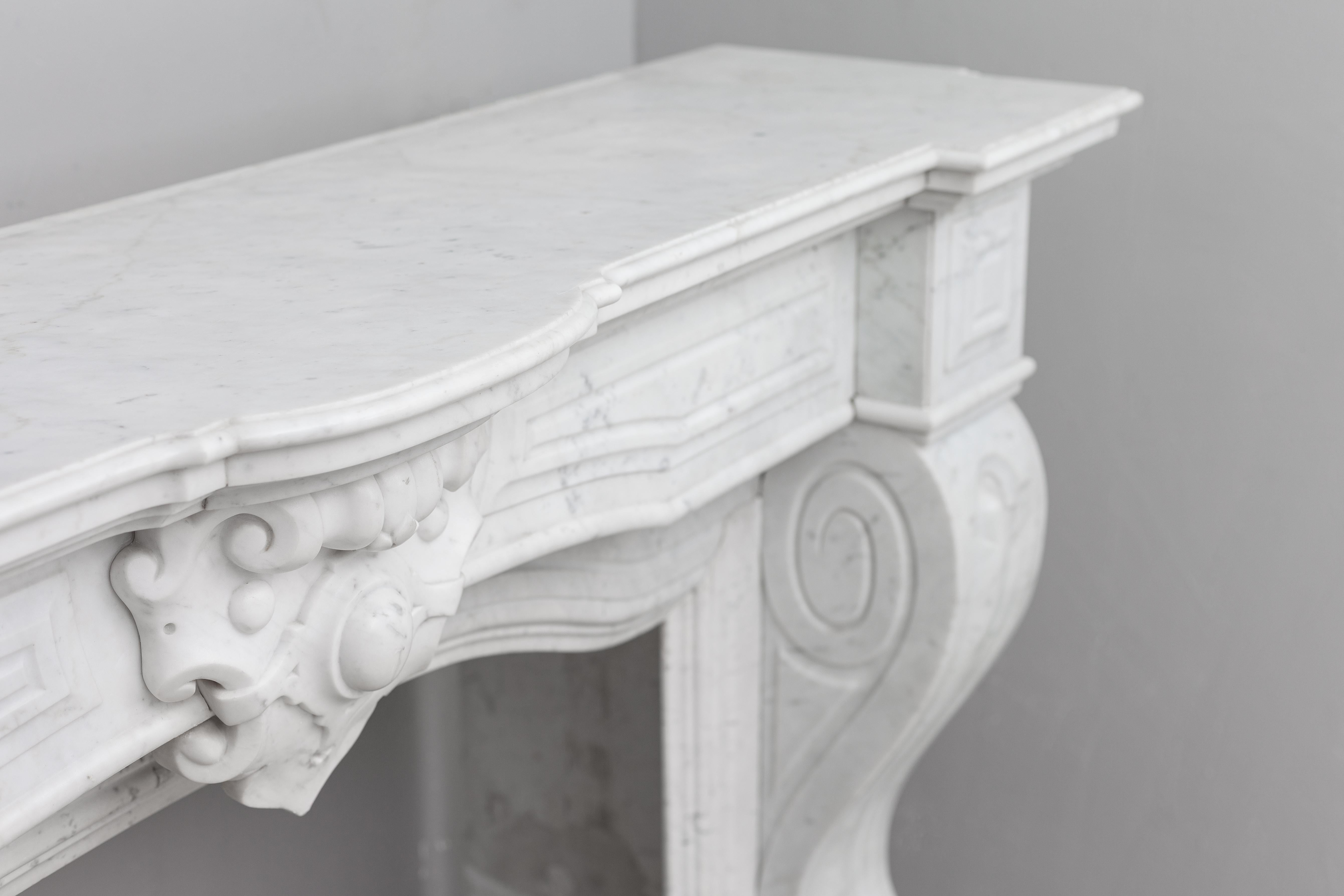 Hand-Carved Louis XV Antique White Carrara Marble fireplace