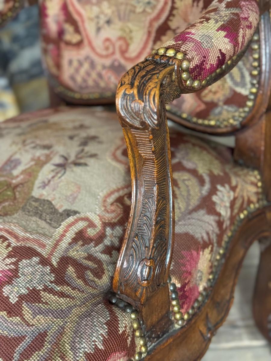 Louis XV armchair in carved walnut, petit point tapestry, 18th century For Sale 1