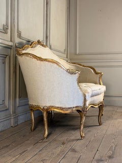 Louis XV basket settee in gilded carved wood, 18th century