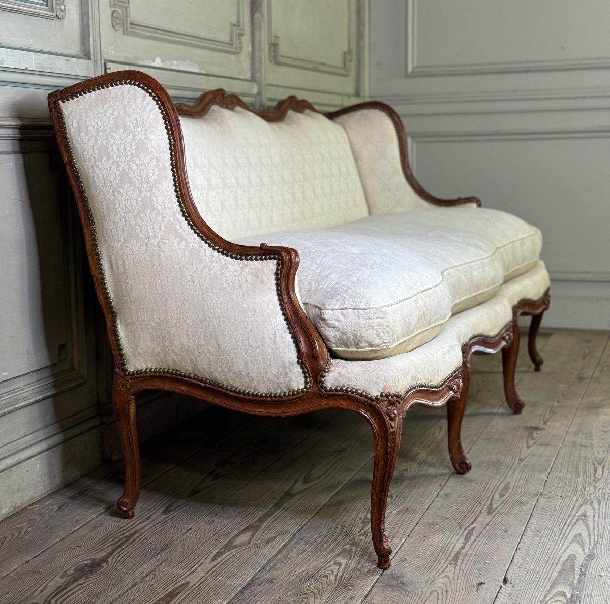 Louis XV Bench In Carved Wood, Stamped Etienne Saint Georges, active until 1736. Traces of worm attacks.