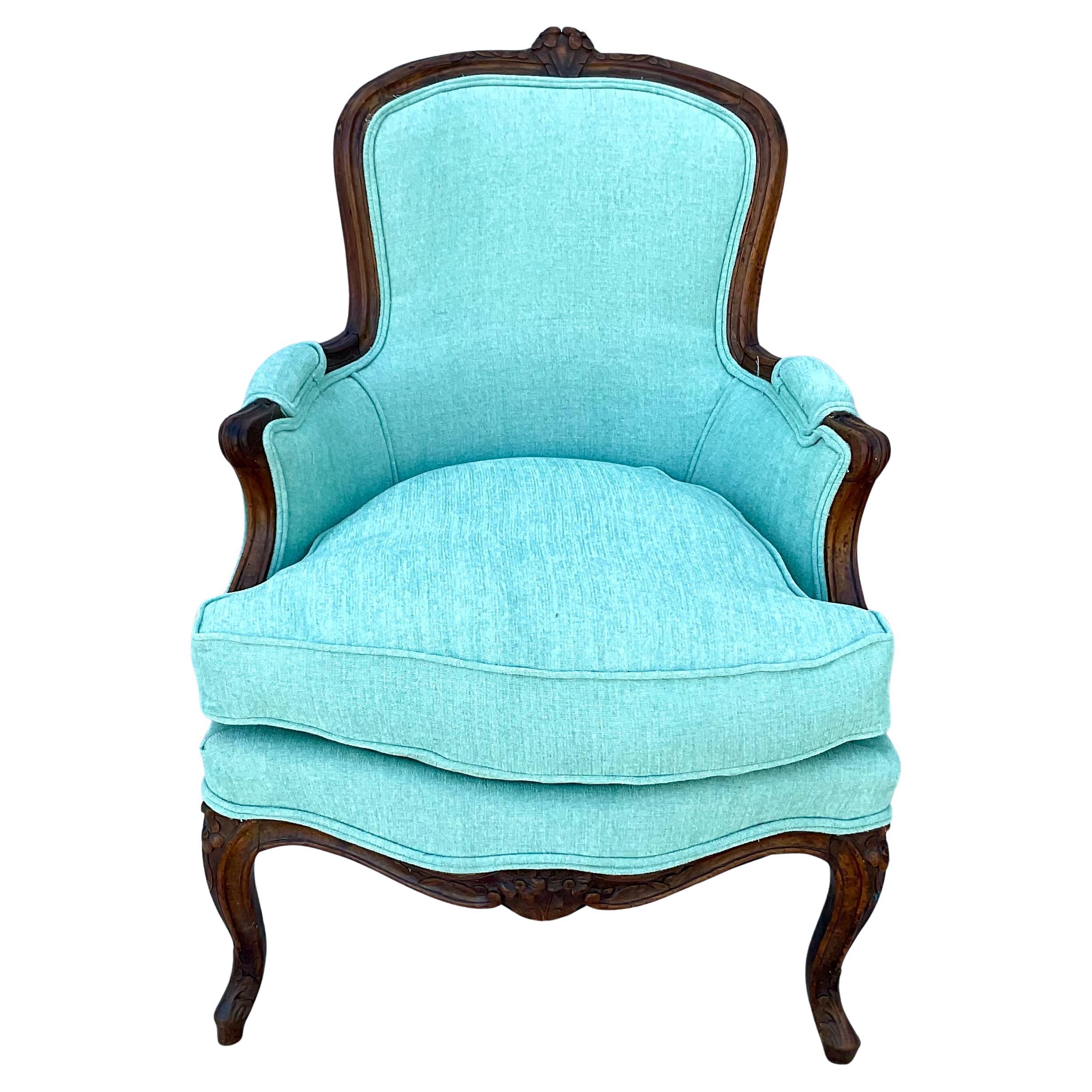 Early 18th Century Louis XV Beechwood Bergère Chair that embodies the elegant and ornate style of the French Rococo period. Chair features soft curves, graceful lines, and intricate detailing. Beechwood is a strong and durable wood often used in