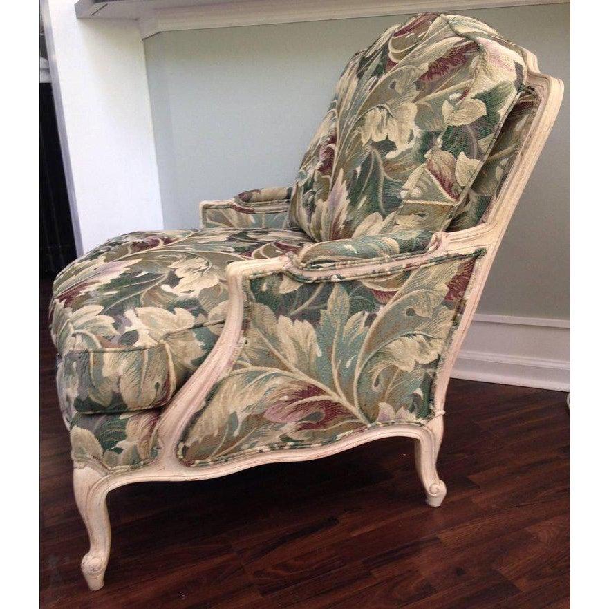 Designed in the timeless Louis XV style, this French bergère club chair is upholstered in a durable tropical fabric that will never go out of style. The green botanical banana leaf tapestry in greens and neutrals will be the perfect addition to your