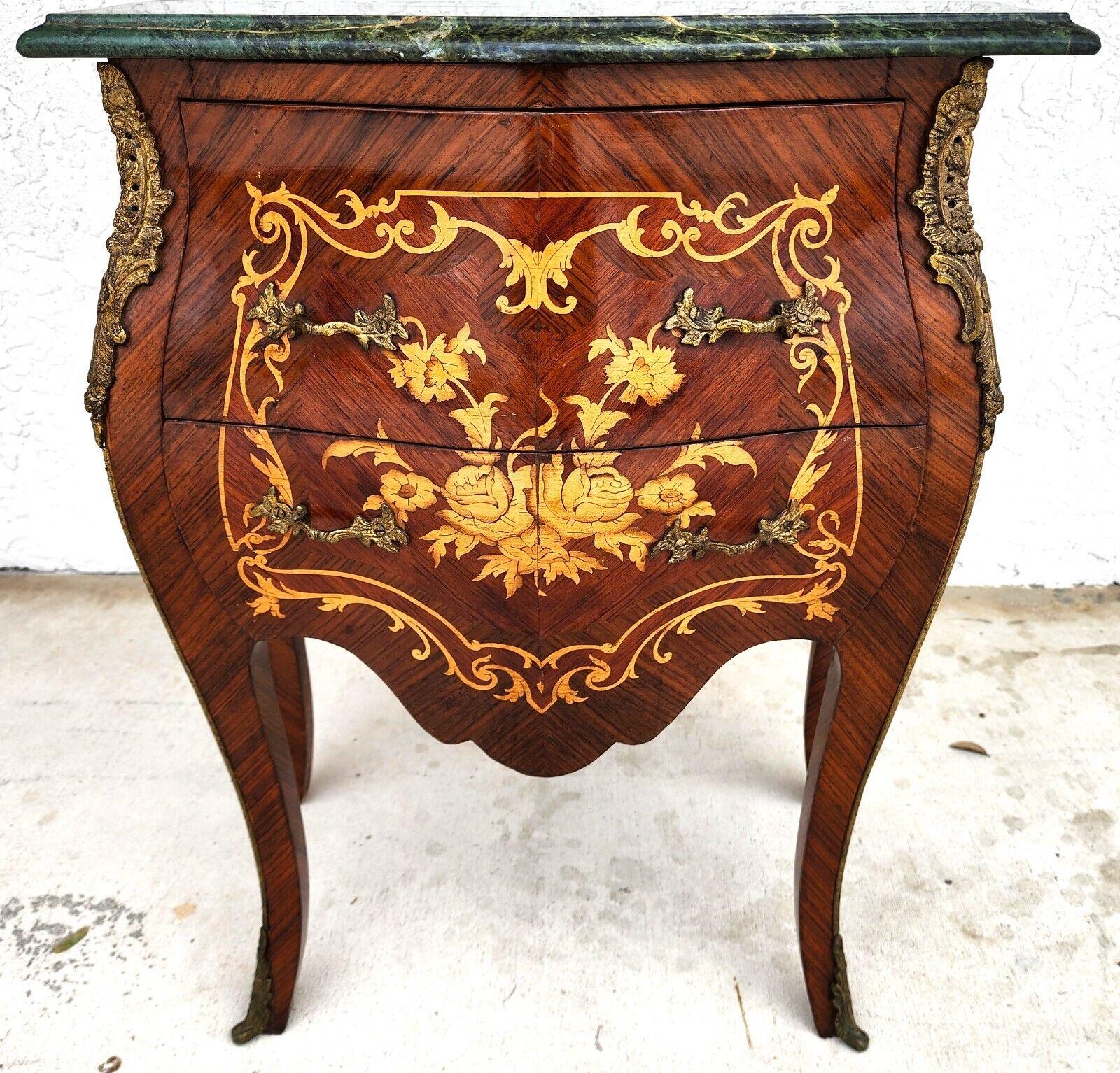 For FULL item description click on CONTINUE READING at the bottom of this page.

Offering One Of Our Recent Palm Beach Estate Fine Furniture Acquisitions Of A
Vintage Louis XV Style Bombay Chest Table with Bronze Ormolu Mounts and Drawer Pulls, and