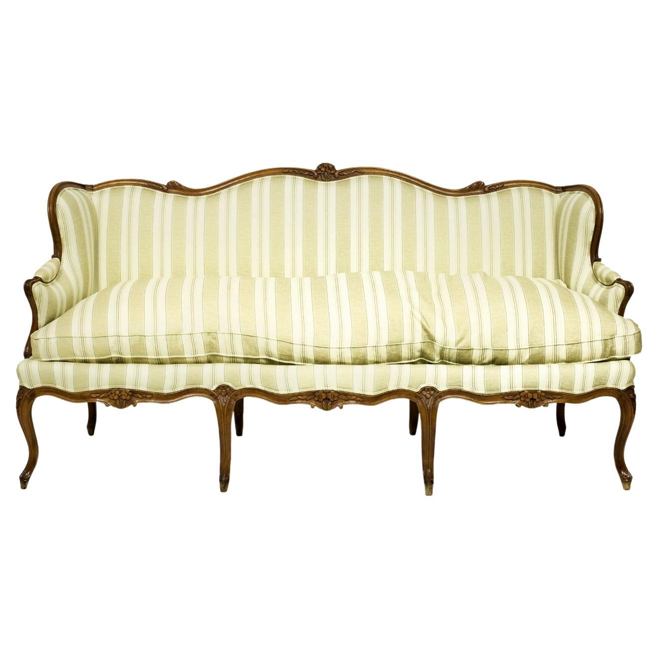 Louis XV Canape in Carved Walnut Wood French work of the 18th Century