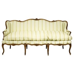 Louis XV Canape in Carved Walnut Wood French work of the 18th Century