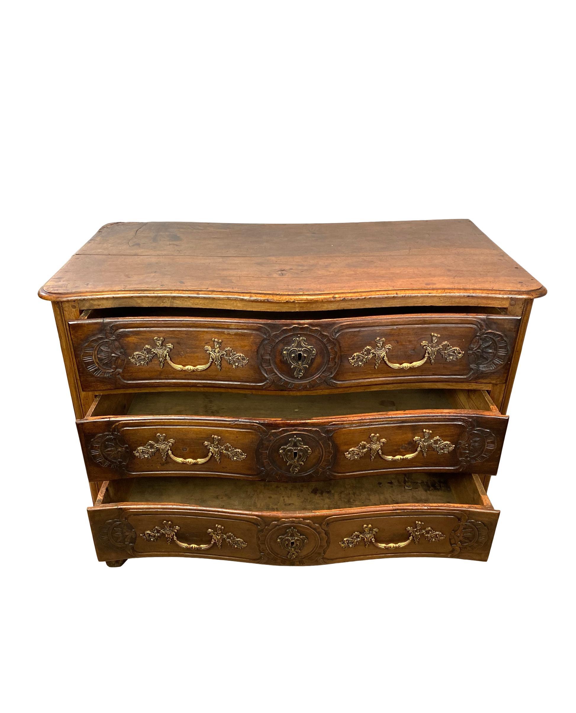 Louis XV carved walnut French commode, Bresse Region, circa 1750
Book Reference:
Robin Ruddy, French Provincial Furniture, Atglen, PA: Schiffer Publishing, 1998, p. 104.  