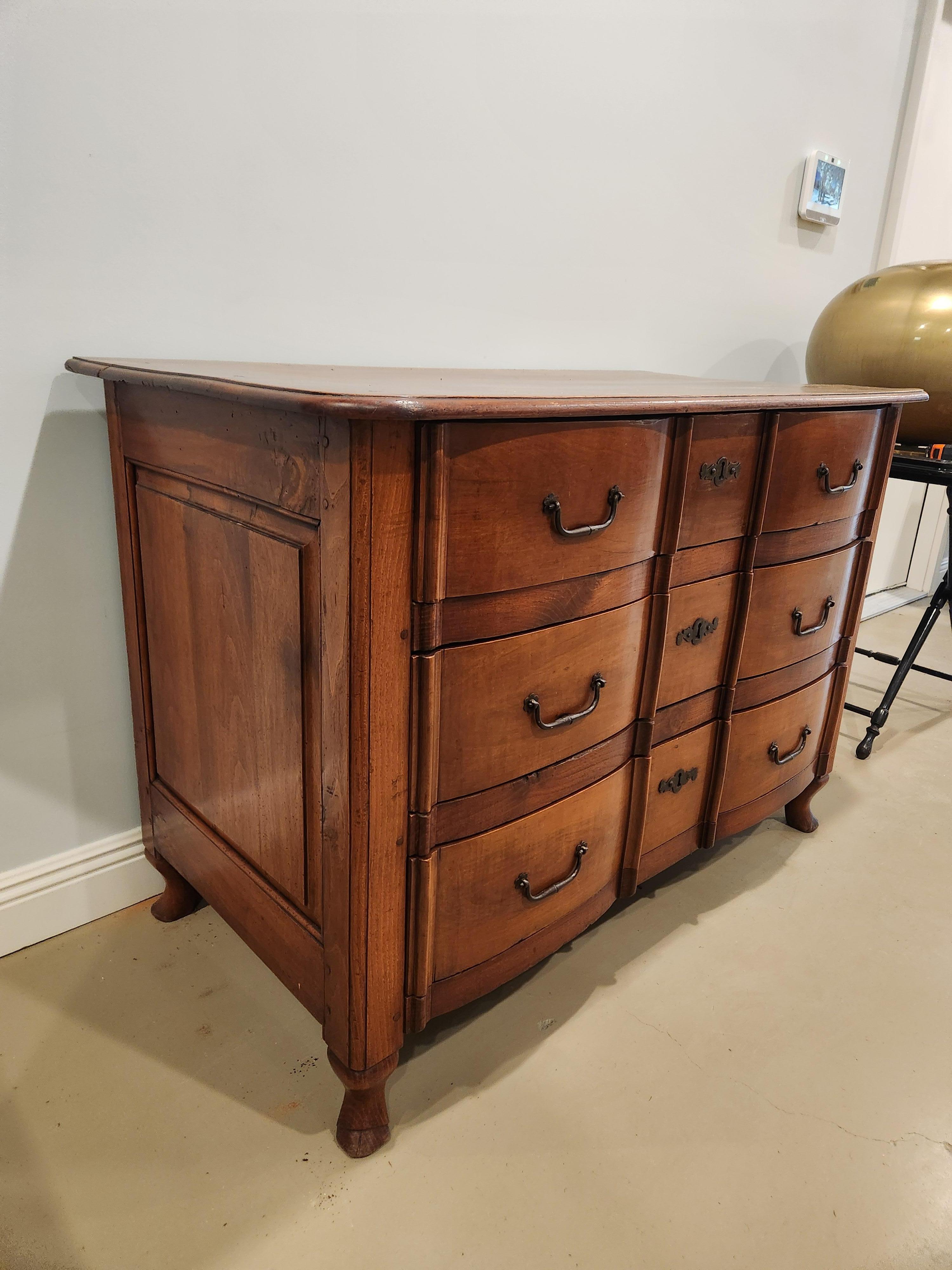 French Louis XV Cherry and Chestnut Serpentine Commode, Circa 1720, Original Hardware For Sale