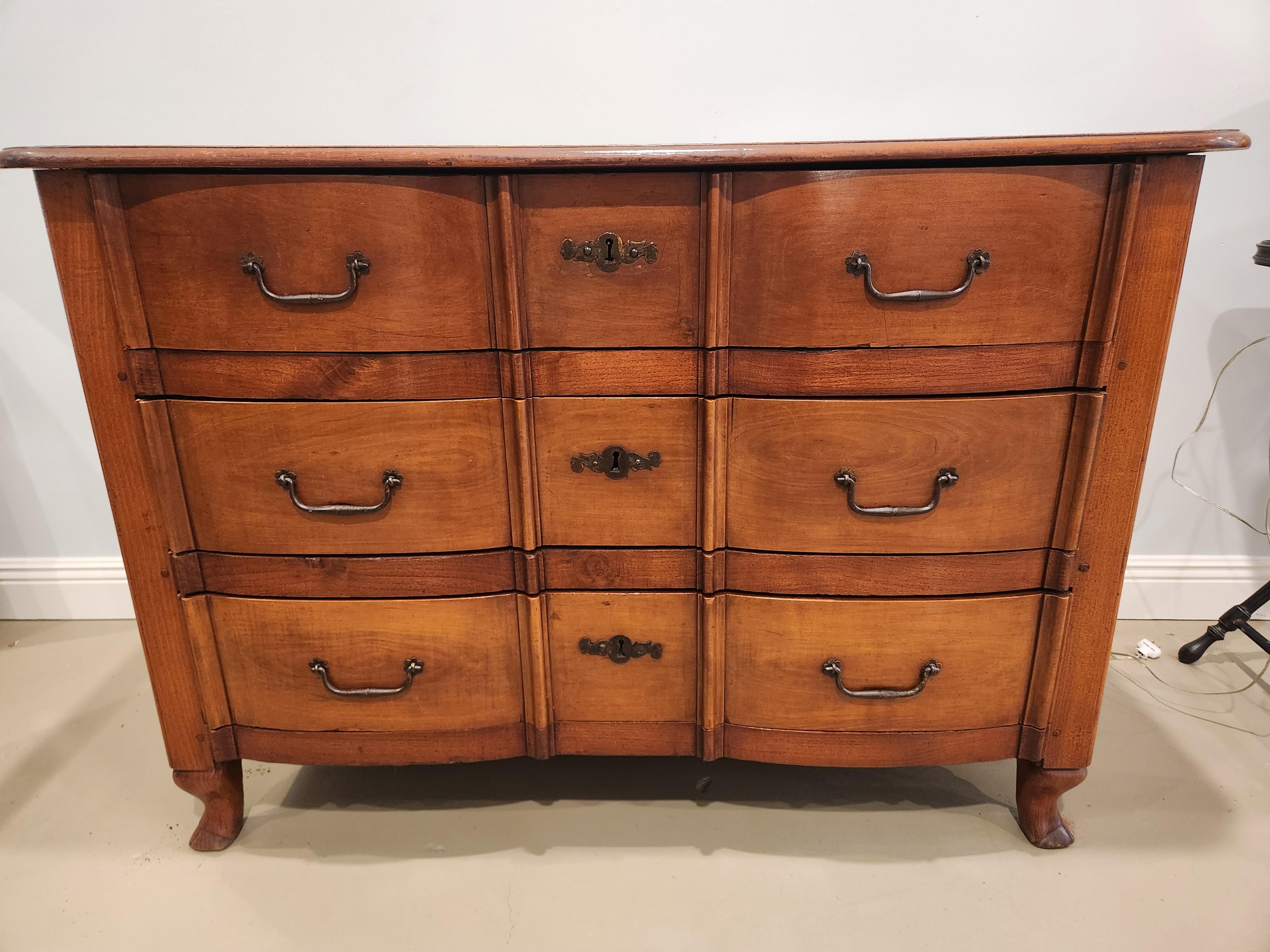 18th Century Louis XV Cherry and Chestnut Serpentine Commode, Circa 1720, Original Hardware For Sale