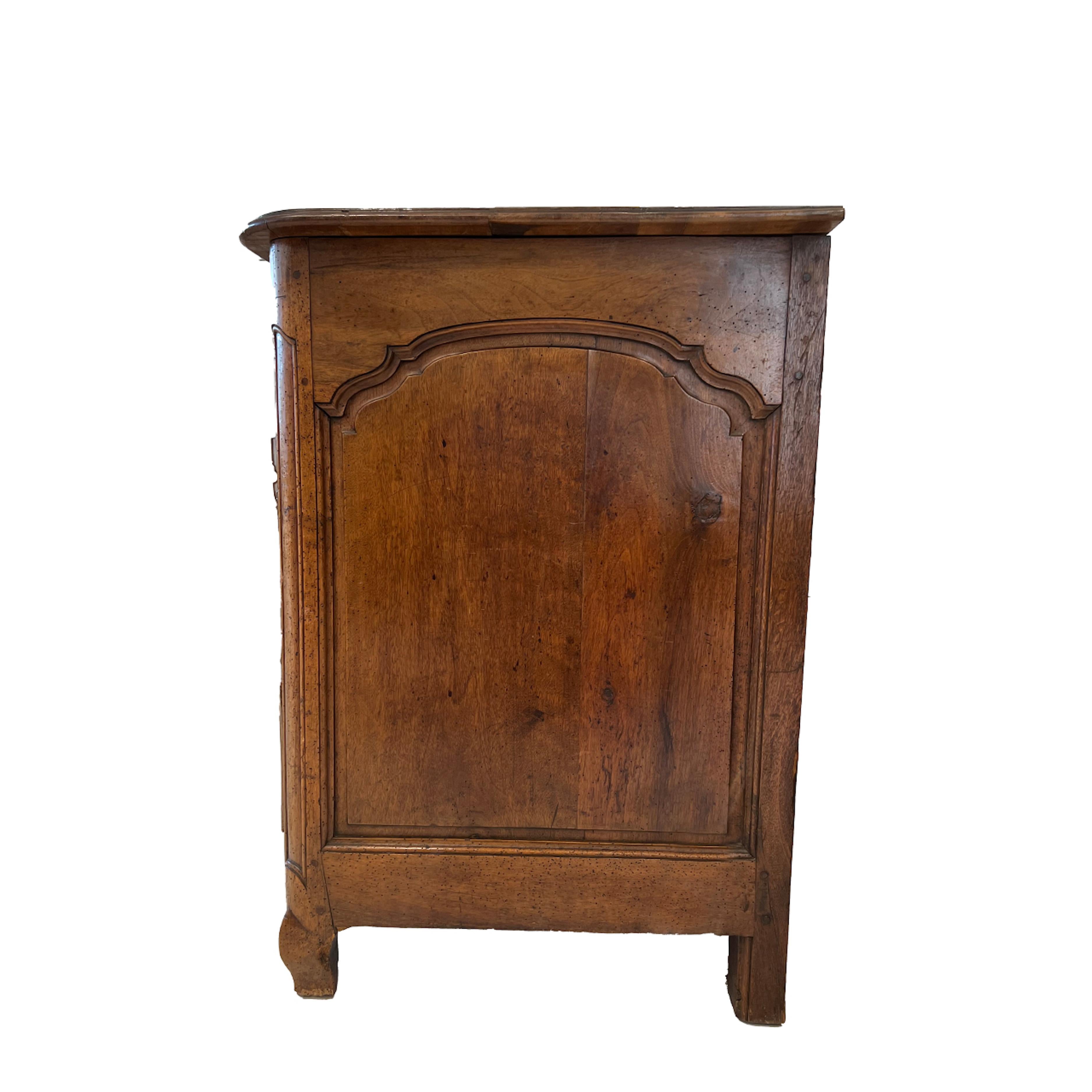 Lovely, three drawer, commode with bronze hardware. Warm wood with graceful lines and generous depth.
