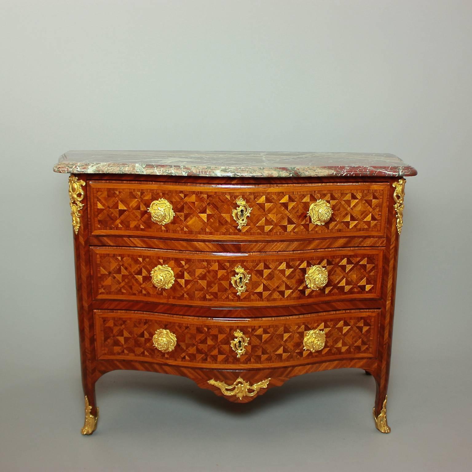 A fine Louis XV commode or chest of drawers stamped 'Mondon' (Francois Mondon, 1694- 1770). This commode with its three rows of drawers bears the maker's stamp of François Mondon (see photo) and is of characteristic rococo form. A marble top 'Campan