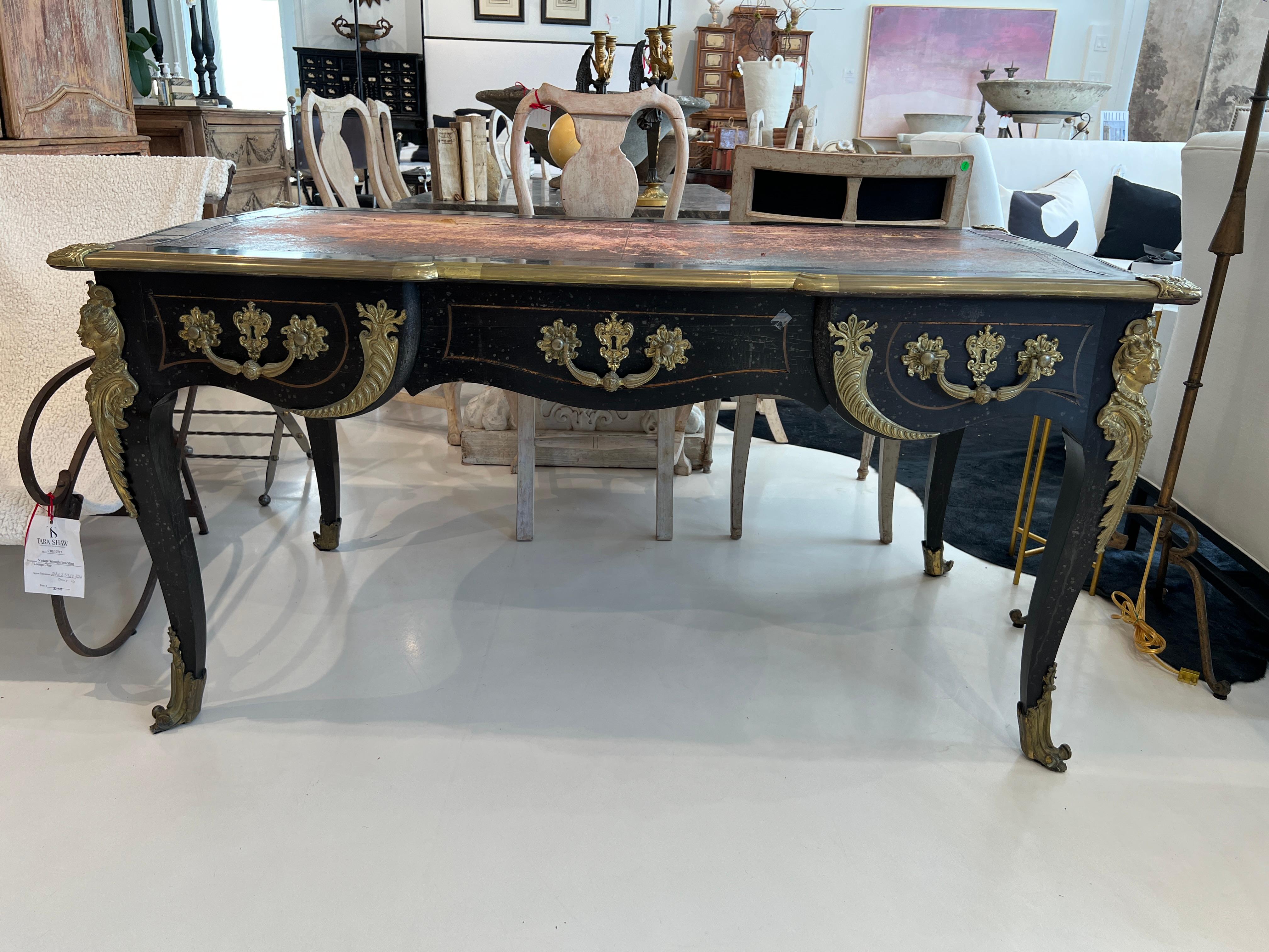 Black and gold Desk with red leather top