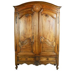 Antique Louis XV Dome Top Walnut Armoire with Star Carved Crest, circa 1750