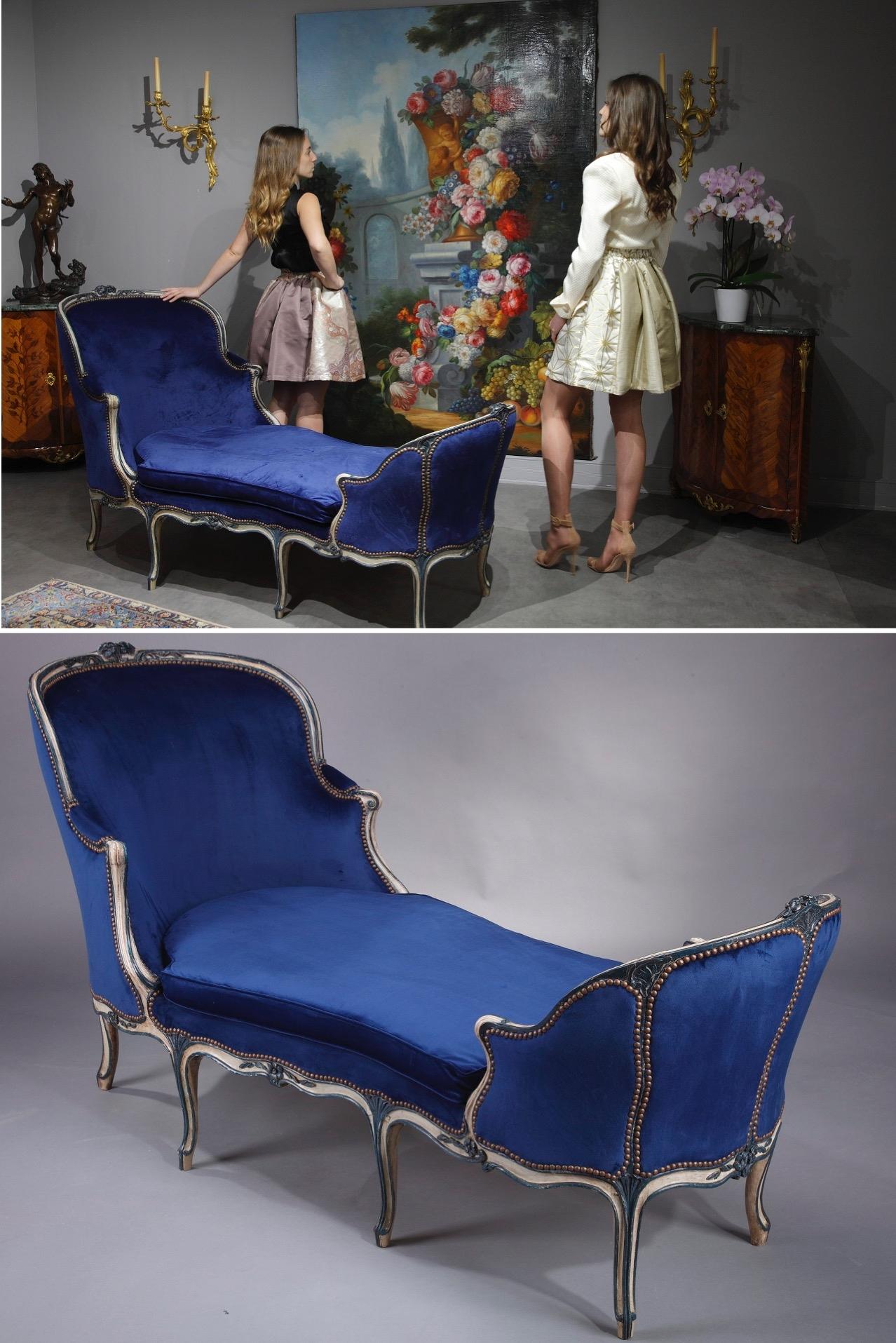 The splendor of the Louis XV period is captured in this magnificent duchesse by the famed French ébéniste Jean-René Nadal (1733-1783). Beautifully upholstered in blue velvet that complements the lacquered beige and light blue wood, this original