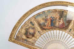 Louis XV-era Fan Displayed In a Carved Wooden Stand, 18th Century.