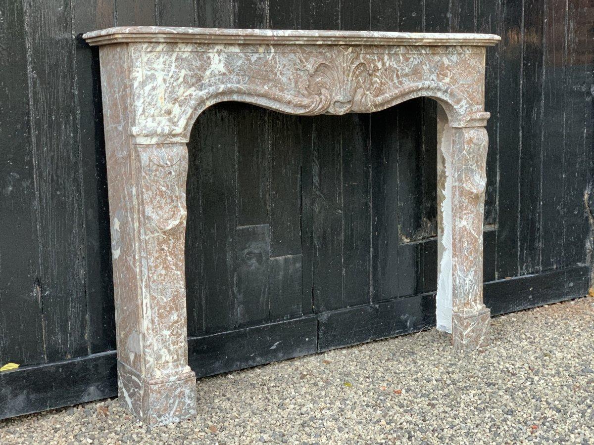 Louis XV fireplace in gray Ardennes marble, 18th century.