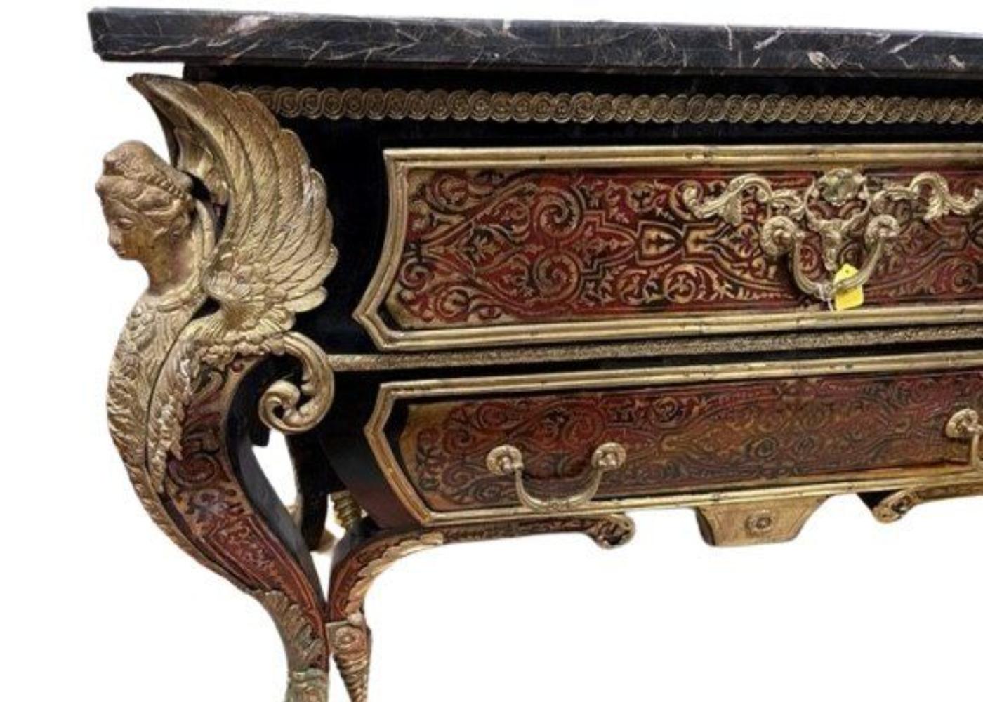 Amazing French Gilt Bronze-Mounted Tortoise Shell Boulle Drawer Table. Drawers on both sides, one side is operational and the other is fixed. It has beautiful bronze angels on the sides of the legs. The marble top is not included.35
