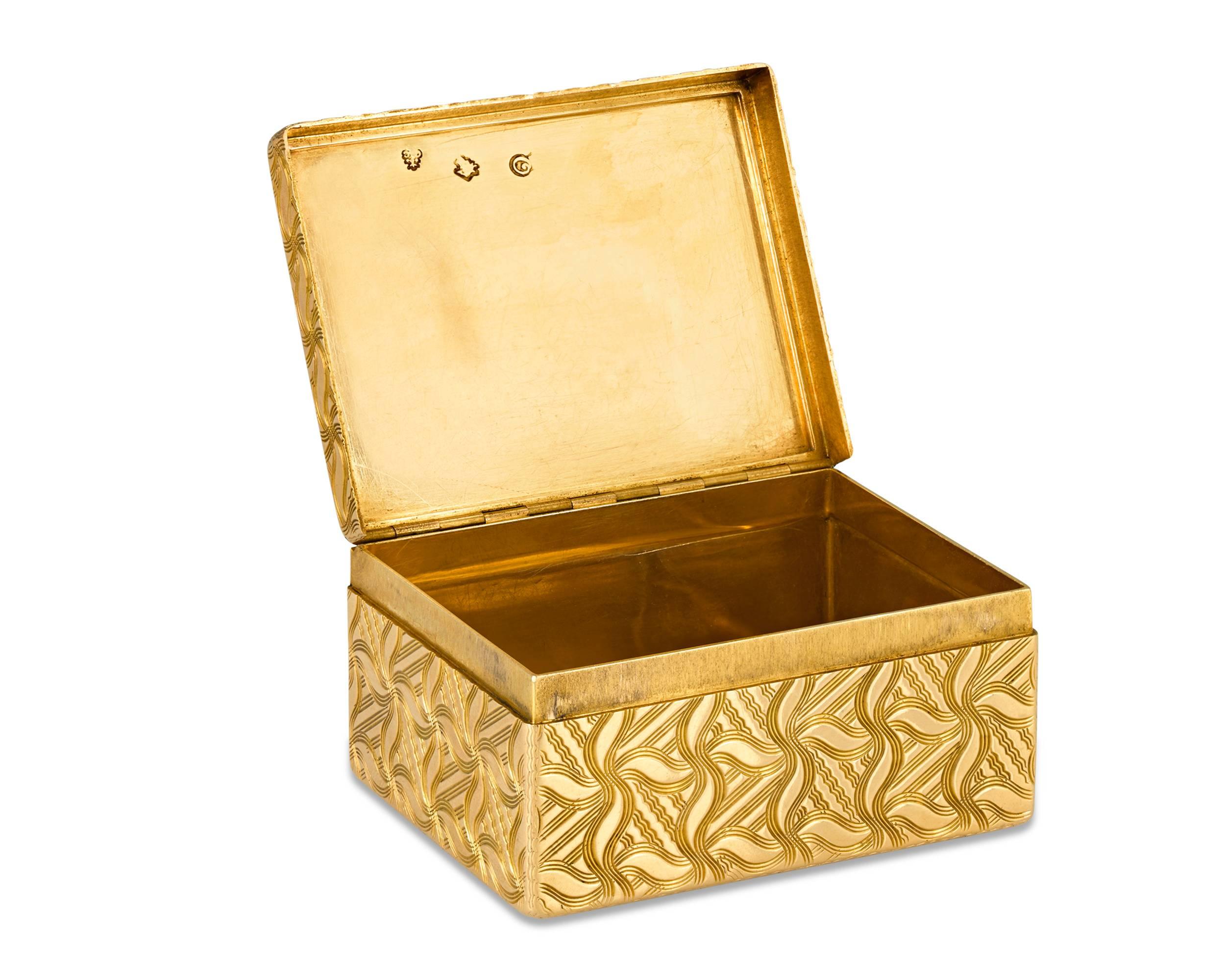This luxurious Louis XV-period gold snuffbox was crafted by master French goldsmith Germain Chayé. Formed of 18-karat yellow gold, this exceptional box displays remarkable artistry with intricate engine-turned guilloché and tracery covering the