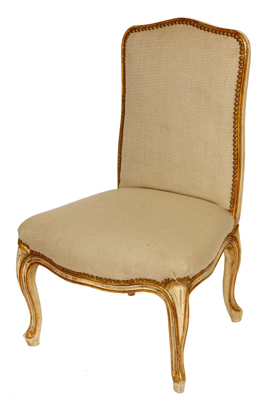 Louis XV French style gilt slipper chair with shaped frame, cabriole legs and nailhead trim.