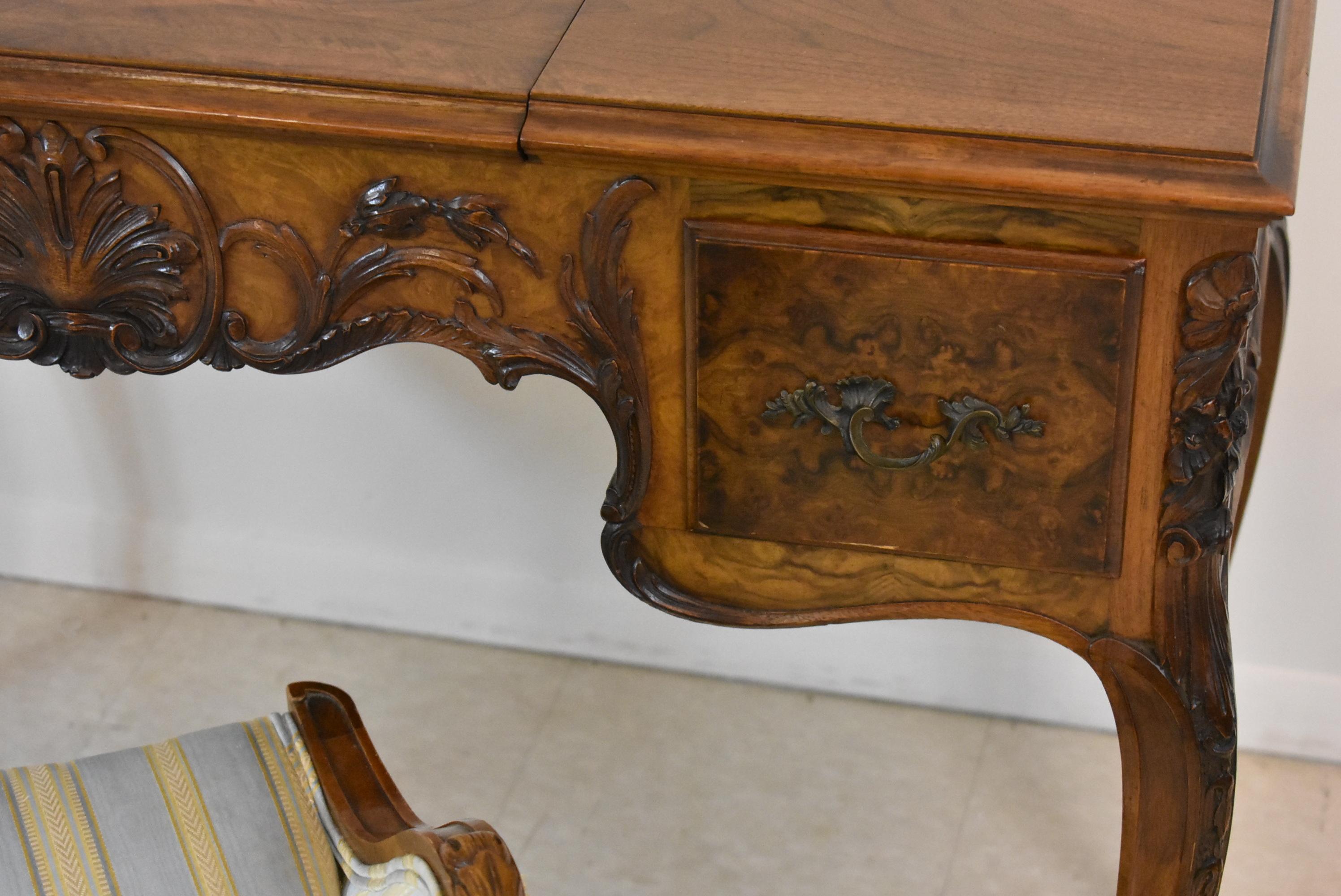 Louis XV French style walnut dressing / vanity table with chair by Irwin Furniture, circa 1920s. Two dove tail drawers.
