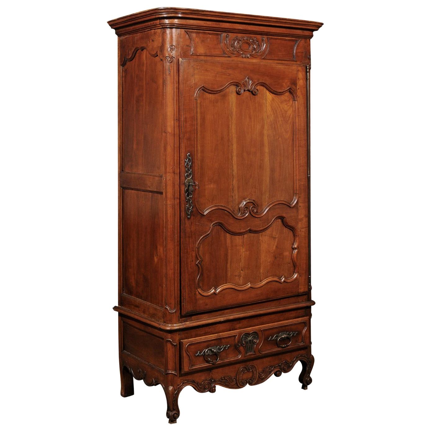 Louis XV Fruitwood Bonnetiere with Carved Paneled Door and Cabriole Feet For Sale