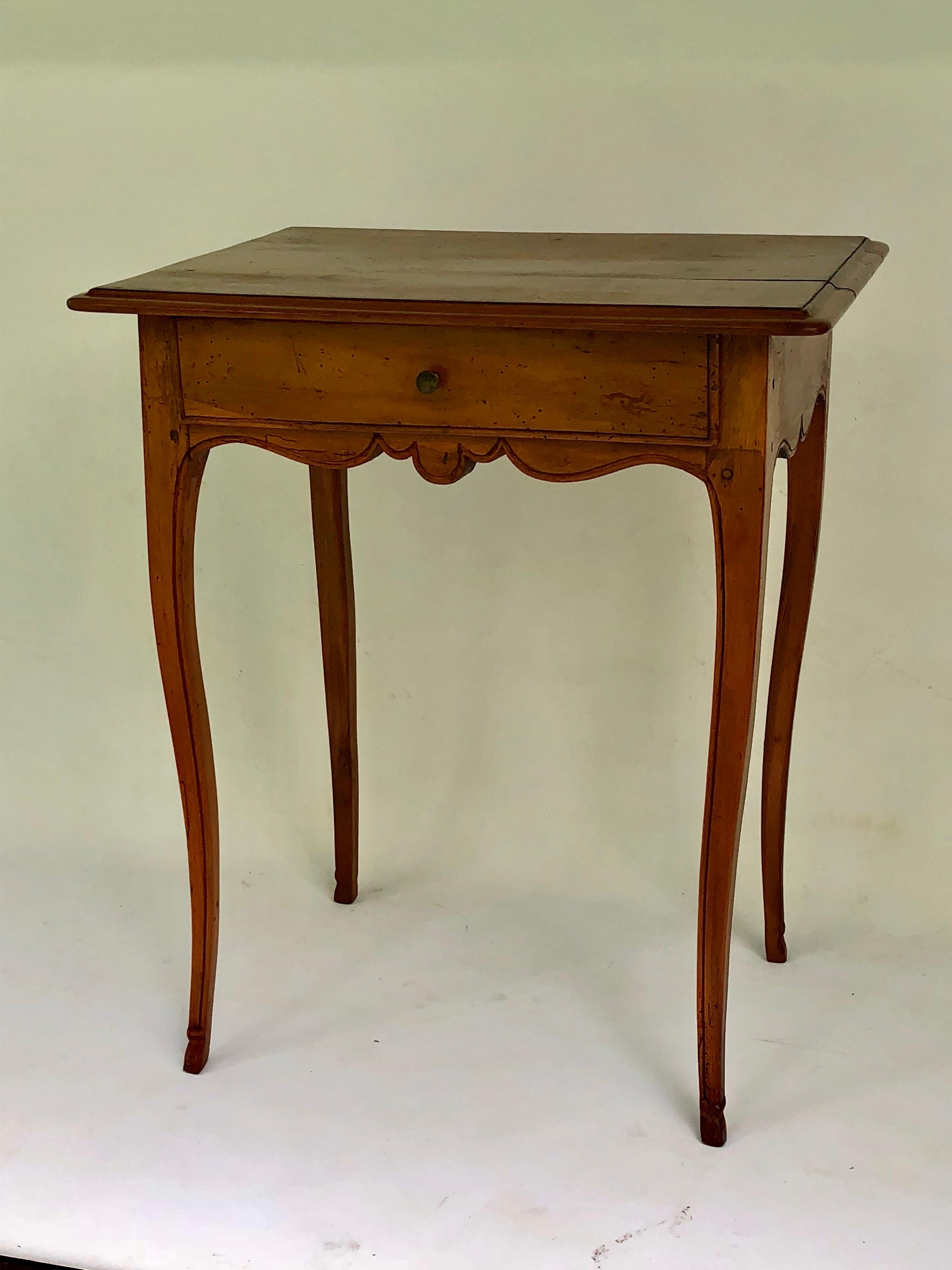 French Louis XV fruitwood table a ecrire. Single drawer fitted with a leather writing surface.