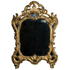 Miroir en bois doré de style Louis XV