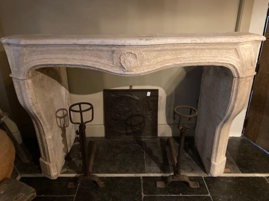 Charming Louis XV Limestone Fireplace Mantel, dating from early 19th Century
Inside dimensions : 124cm wide & 94cm high