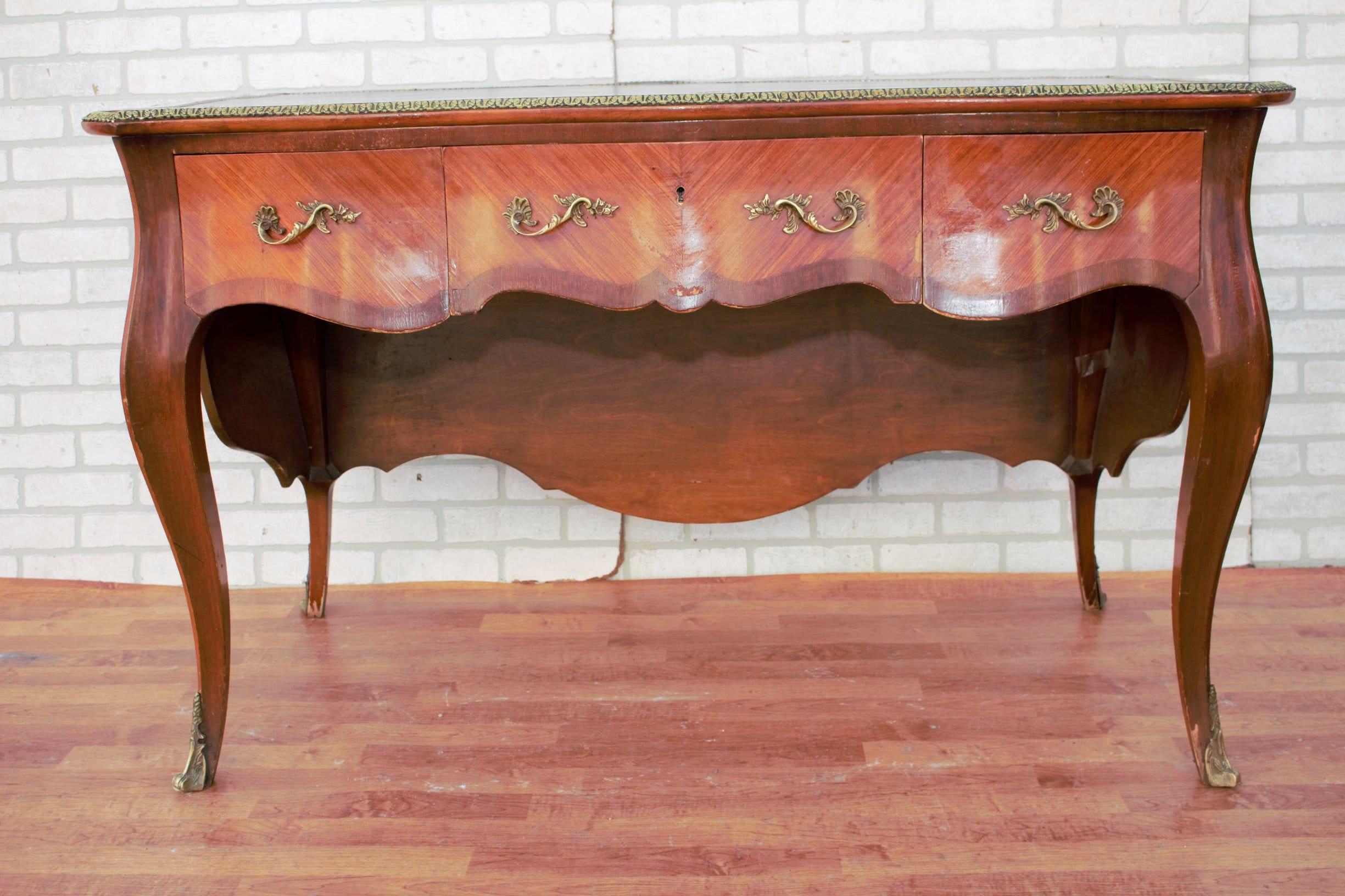 French Louis XV Marquetry Style Mahogany Brass Ormolu Mounted Bombe Leather Top Desk For Sale