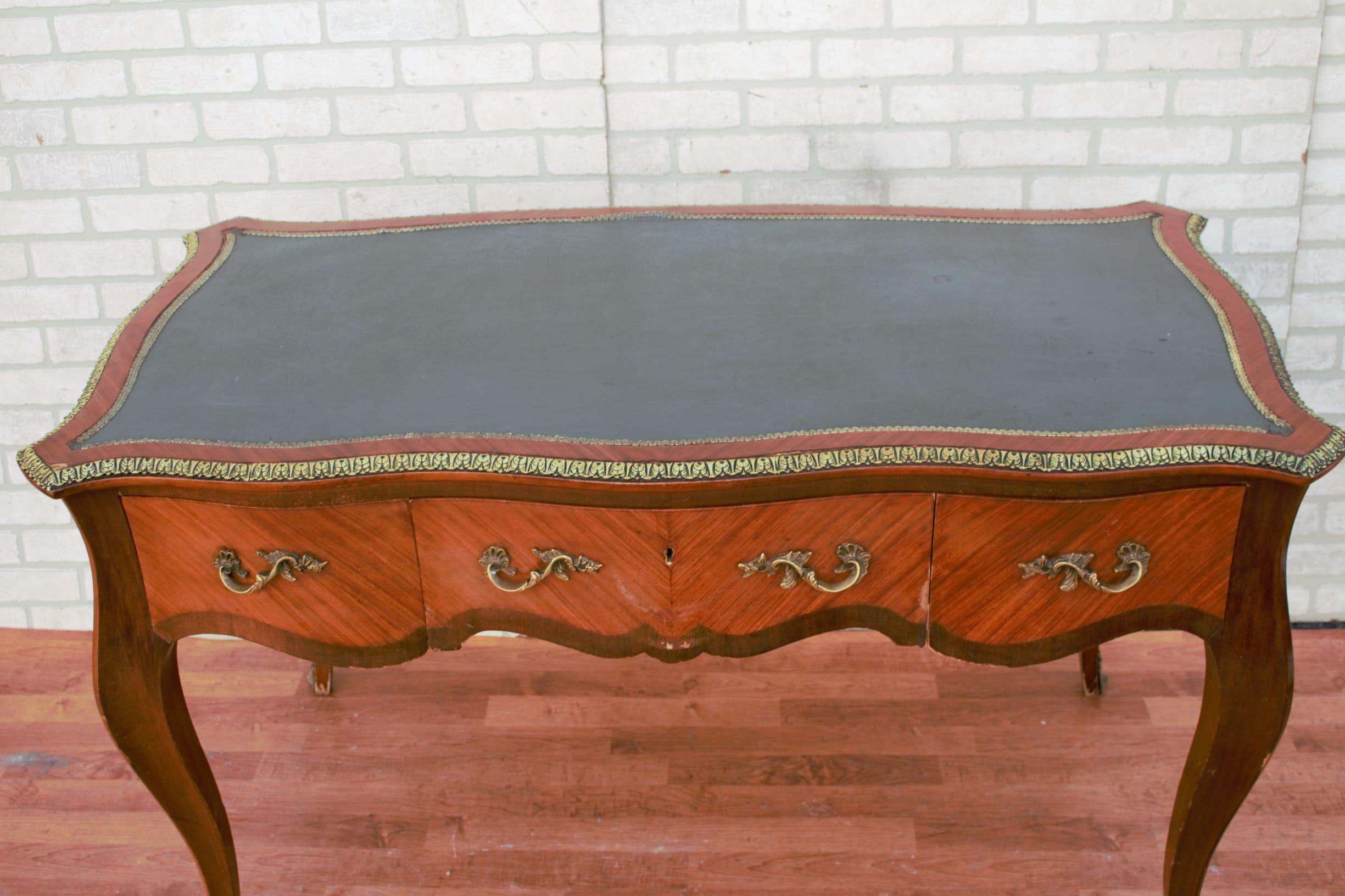 Mid-20th Century Louis XV Marquetry Style Mahogany Brass Ormolu Mounted Bombe Leather Top Desk For Sale