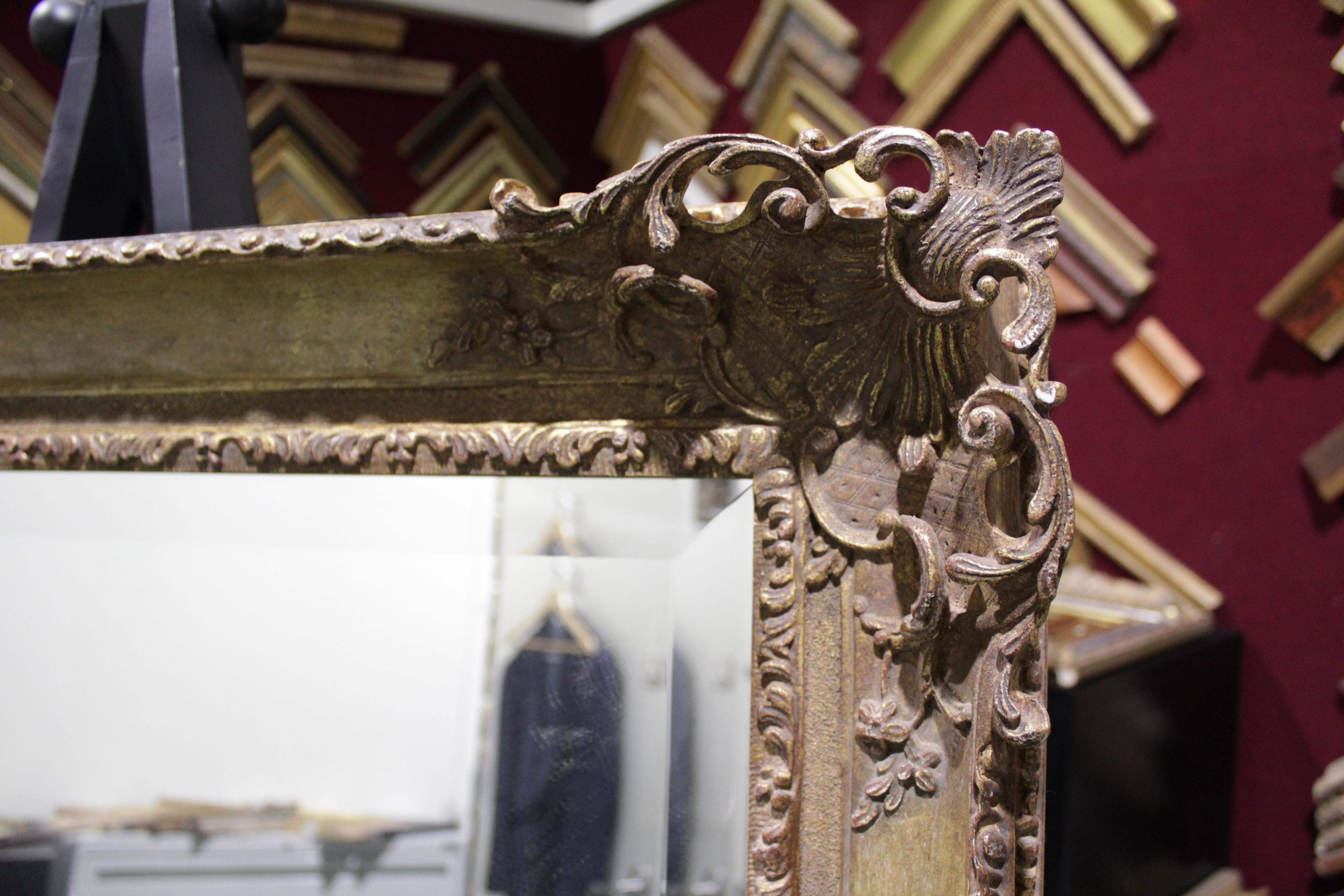 Antique reproduction Louis mirror.